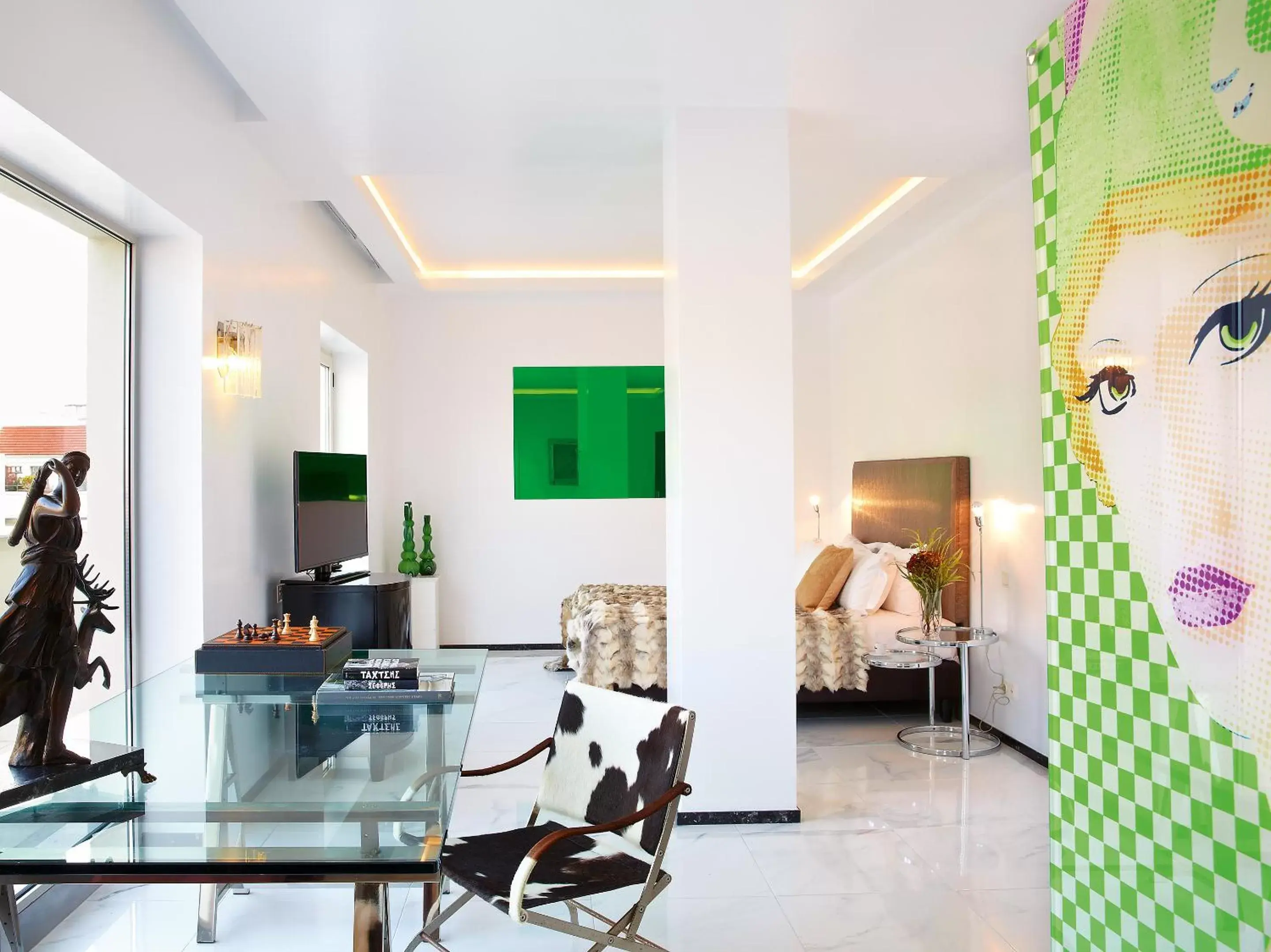 Seating area, Bed in Grecotel Pallas Athena Seating area, Bed in Grecotel Pallas Athena