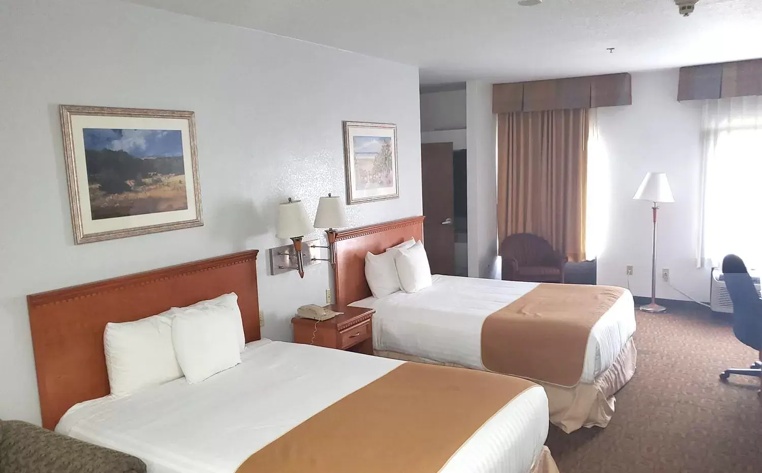 Bed in Coratel Inn & Suites by Jasper New Braunfels IH-35 EXT 189