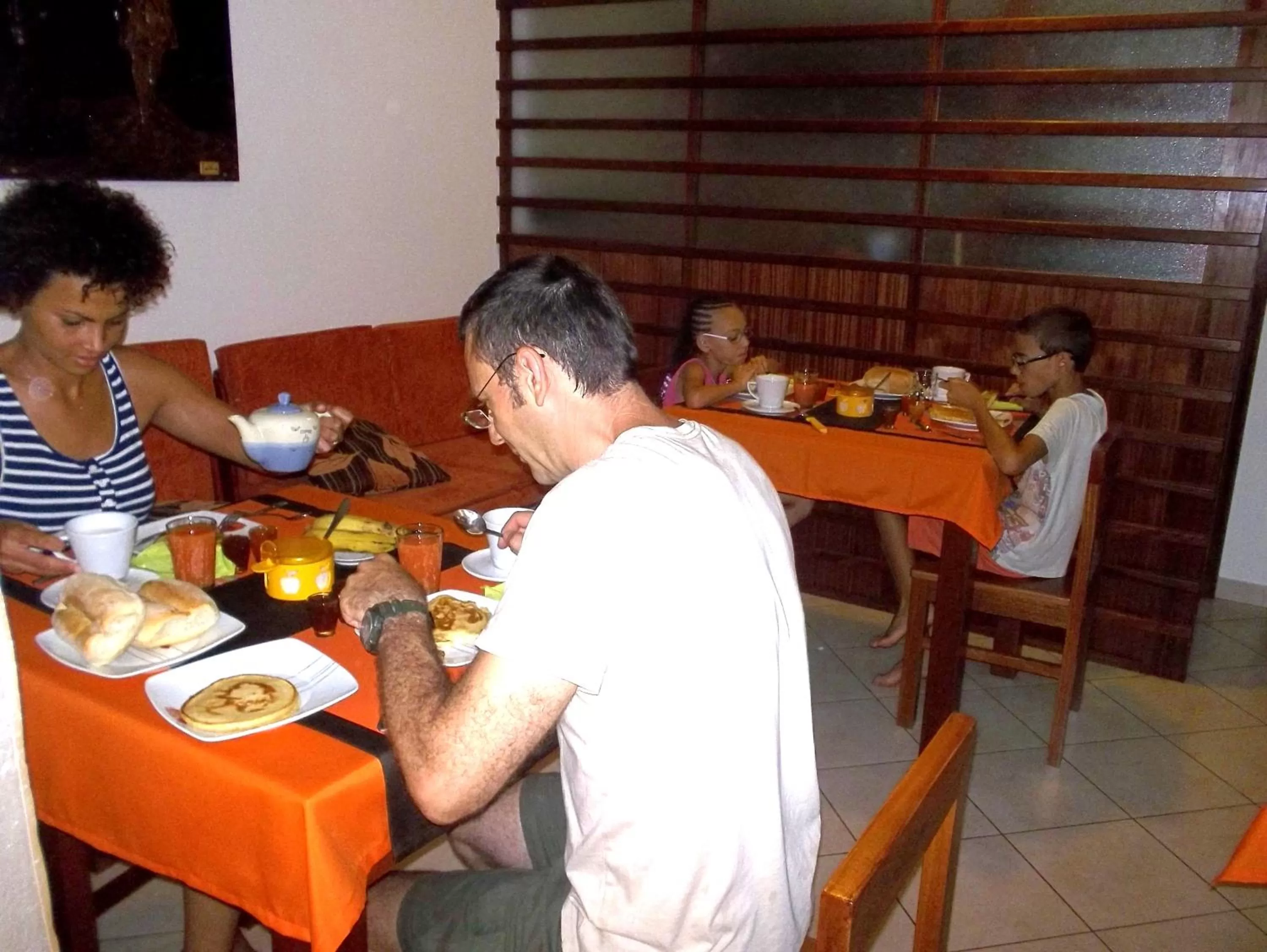Communal lounge/ TV room in Basic Hotel
