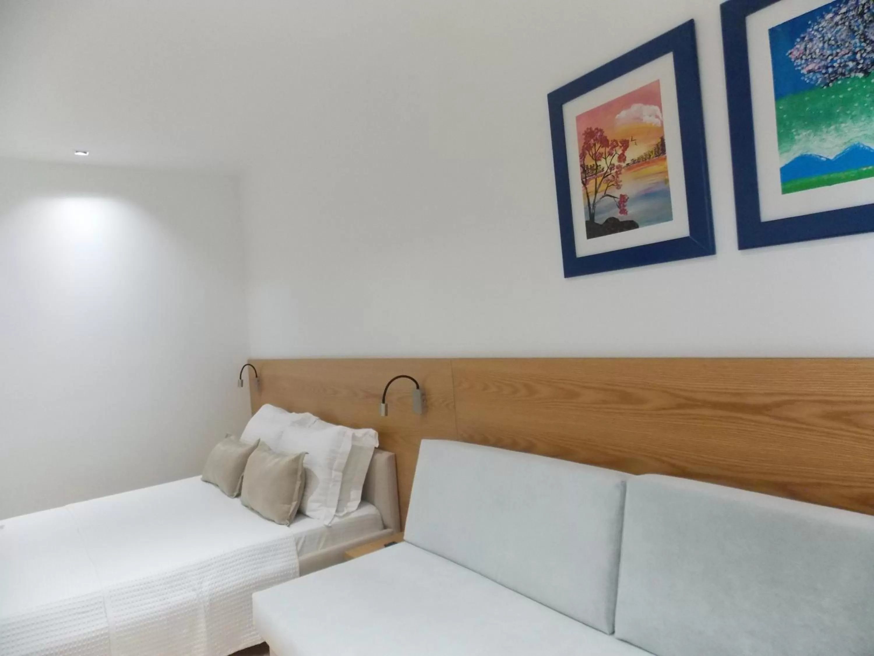 Living room, Bed in Hotel Piccolino