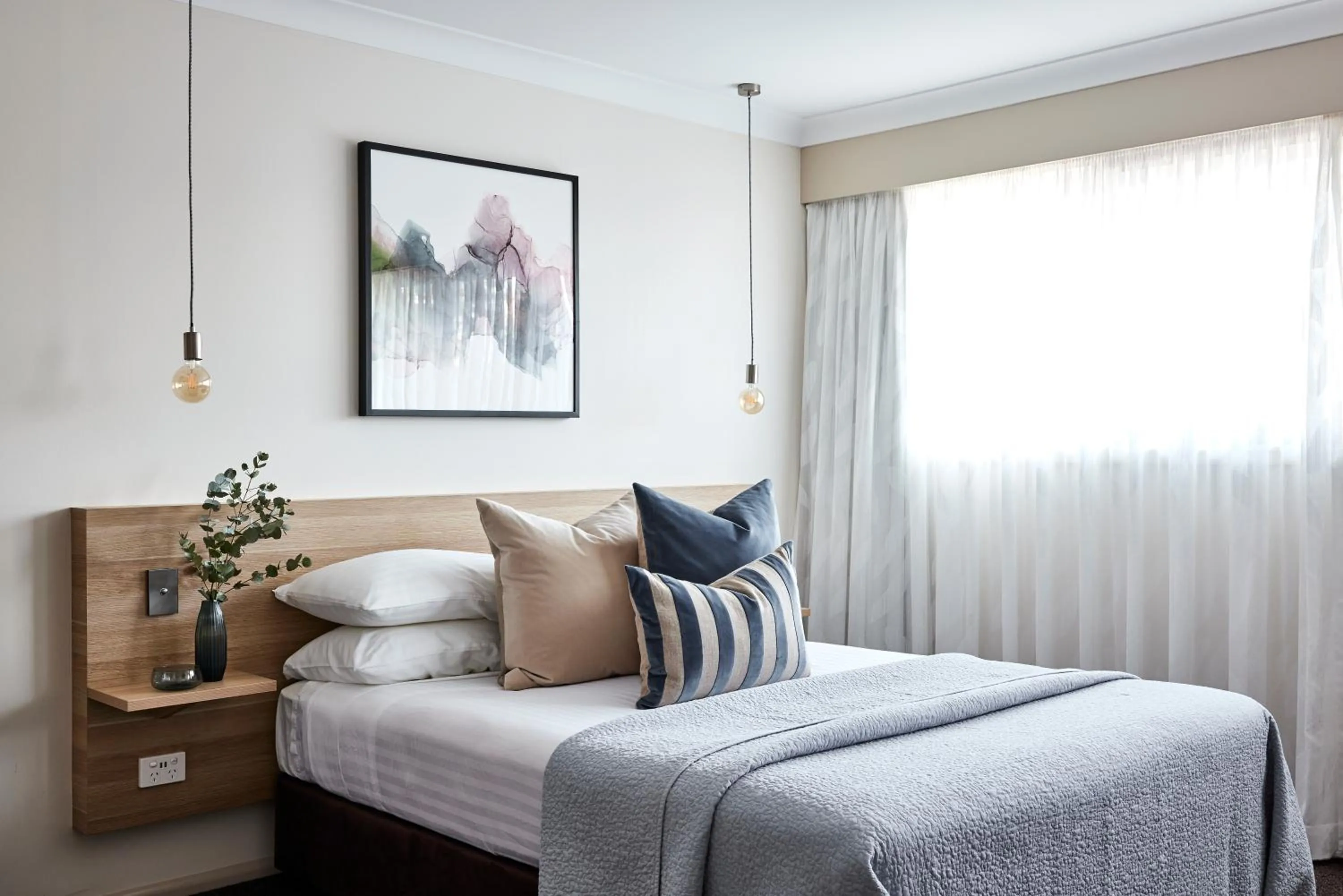 Bed in Central Caleula Motor Lodge