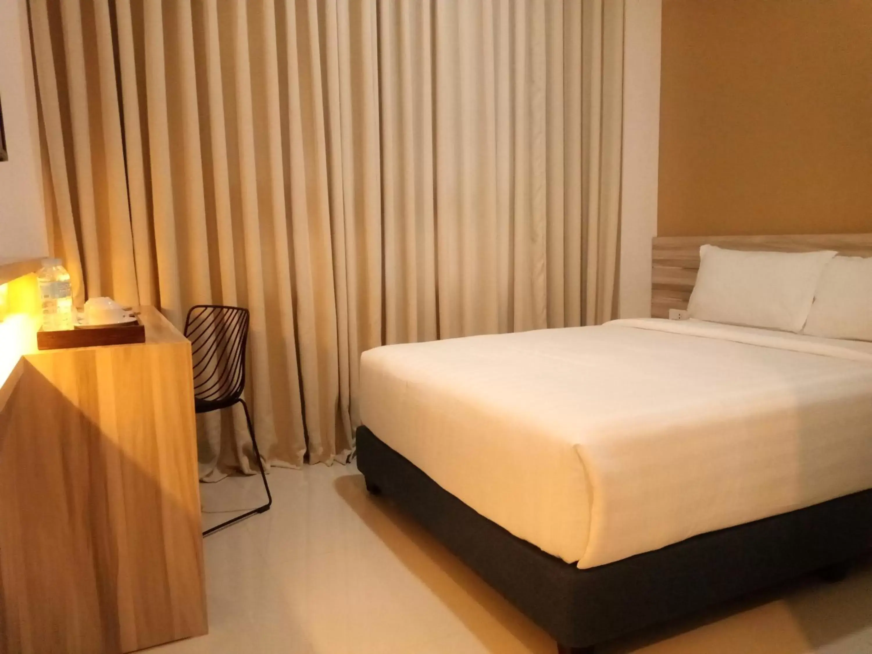 Bed in Figtree Hotel