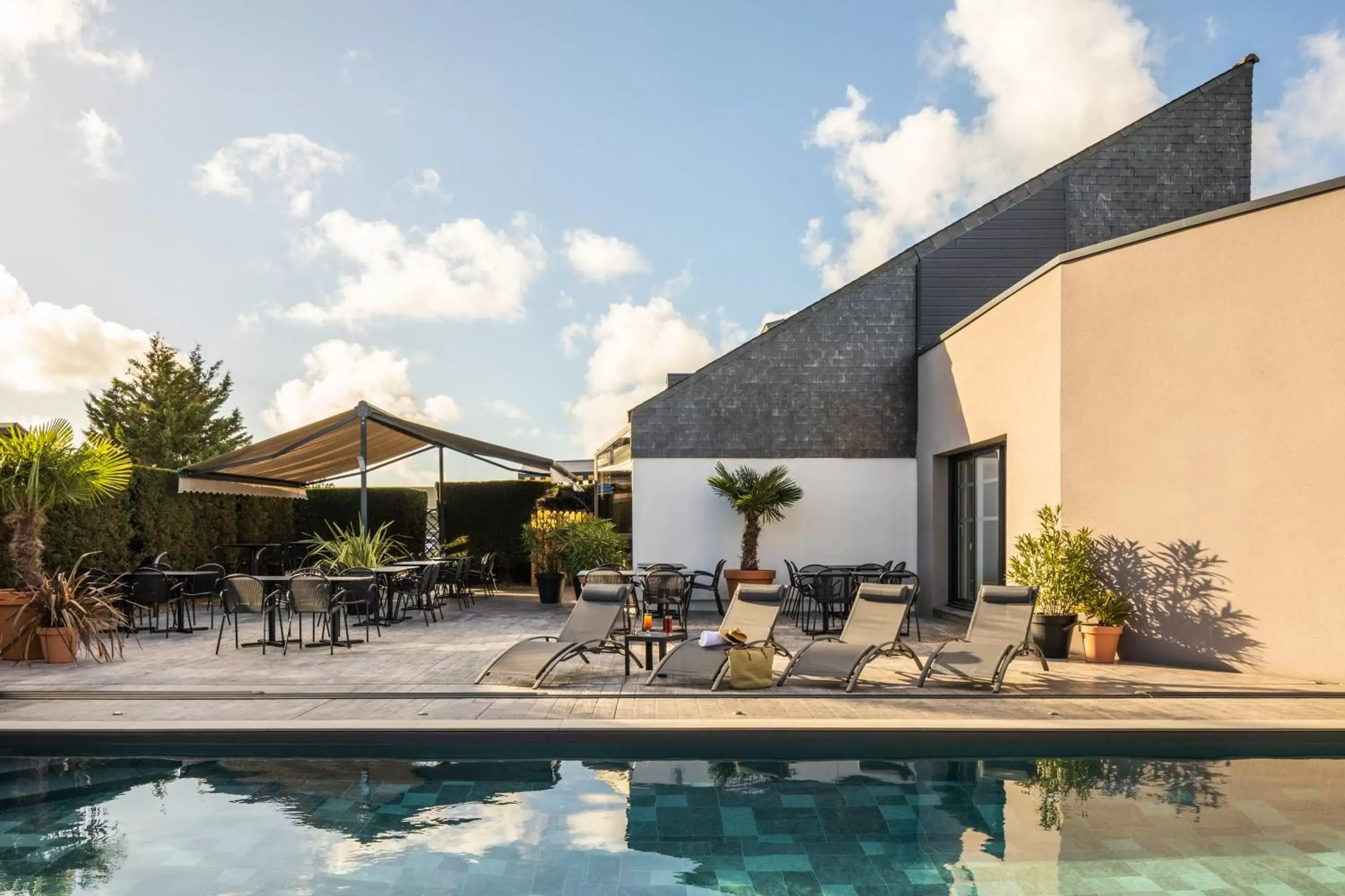 Patio, Swimming Pool in ibis Saint-Nazaire - Trignac