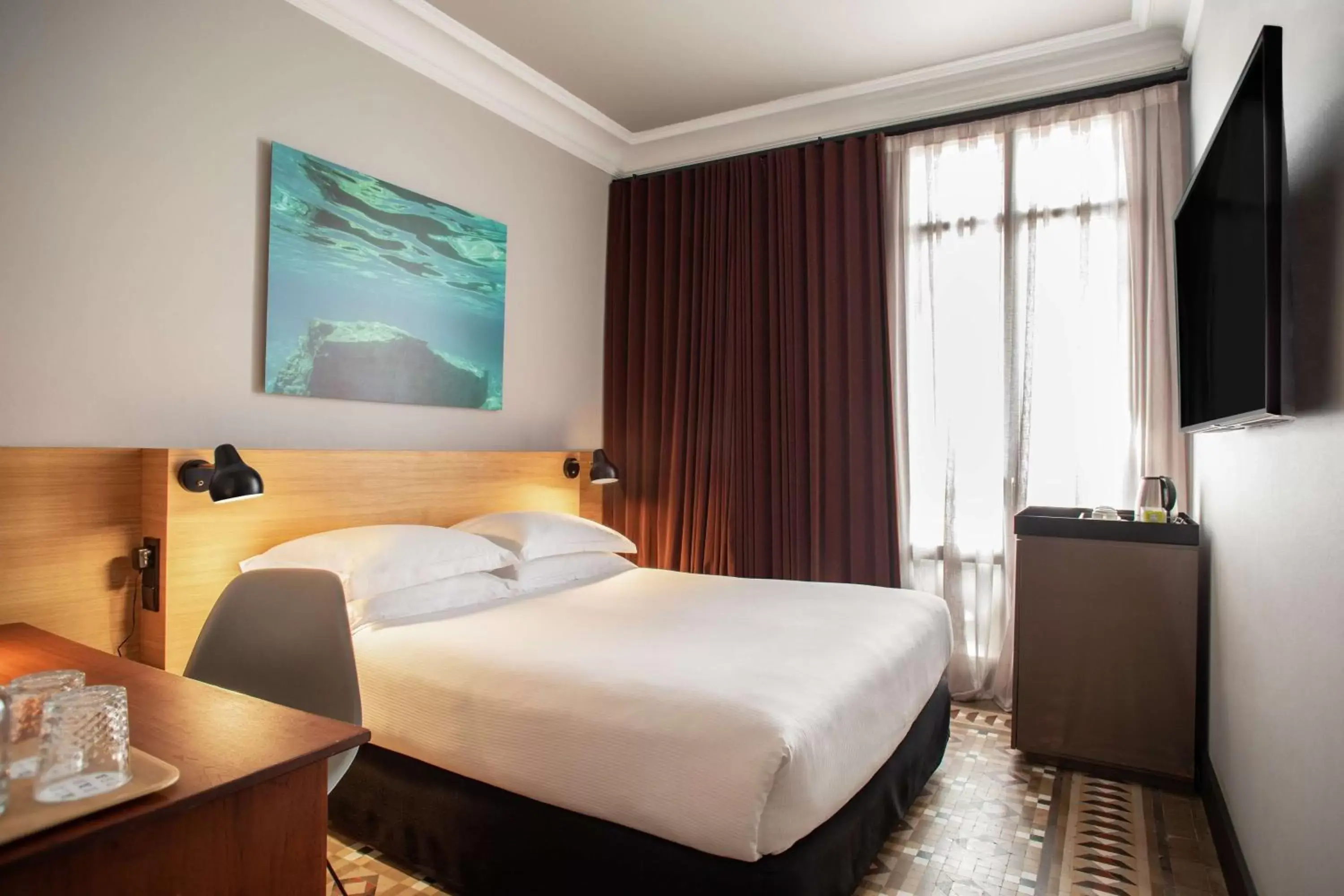 Bed in Alexandra Barcelona Hotel, Curio Collection by Hilton