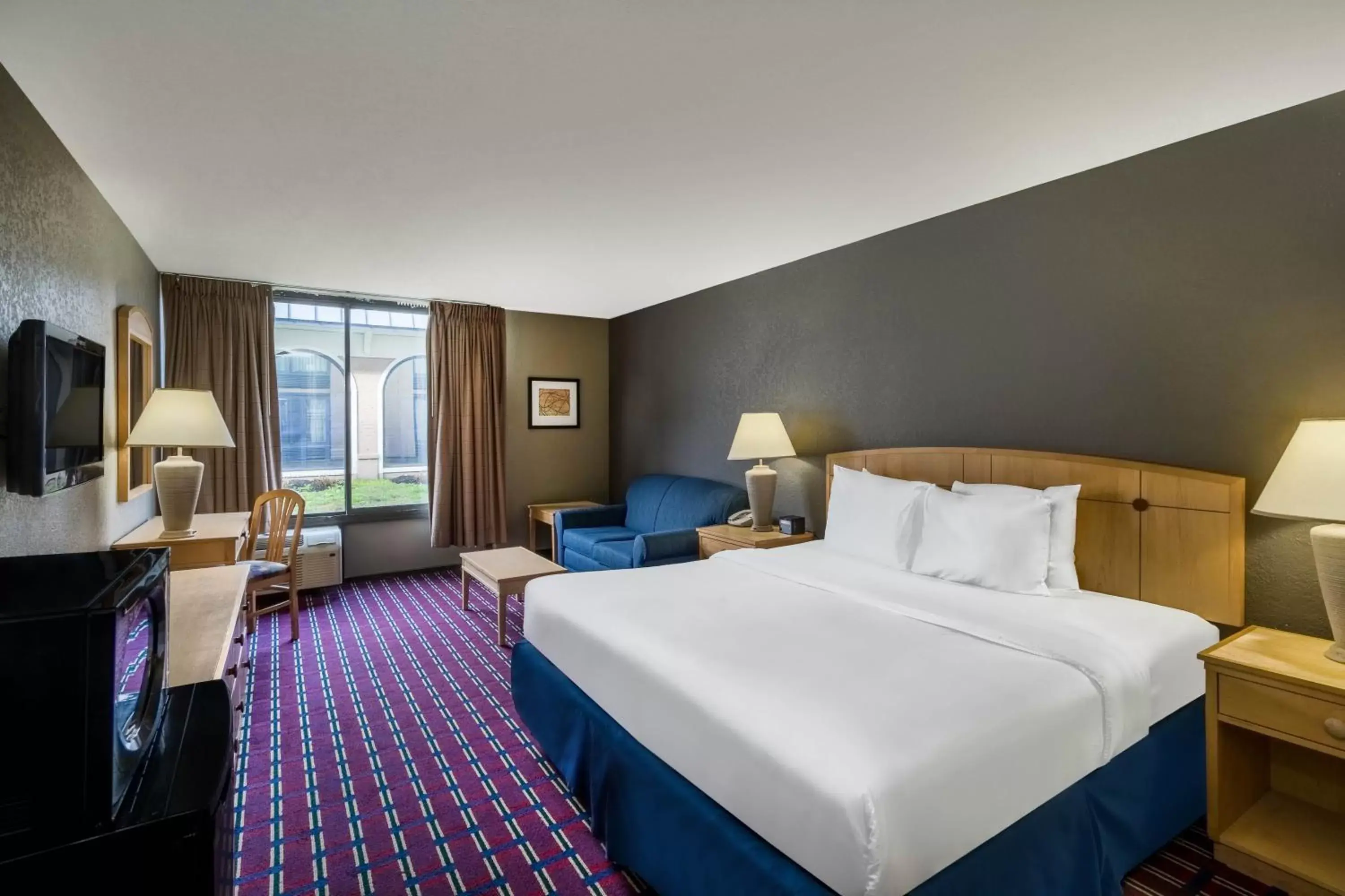 Photo of the whole room in Travelodge by Wyndham Memphis Airport/Graceland