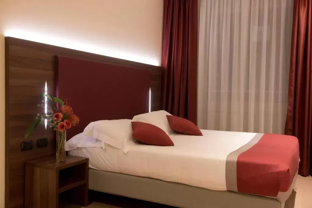 Bed in Duomo Hotel & Apartments