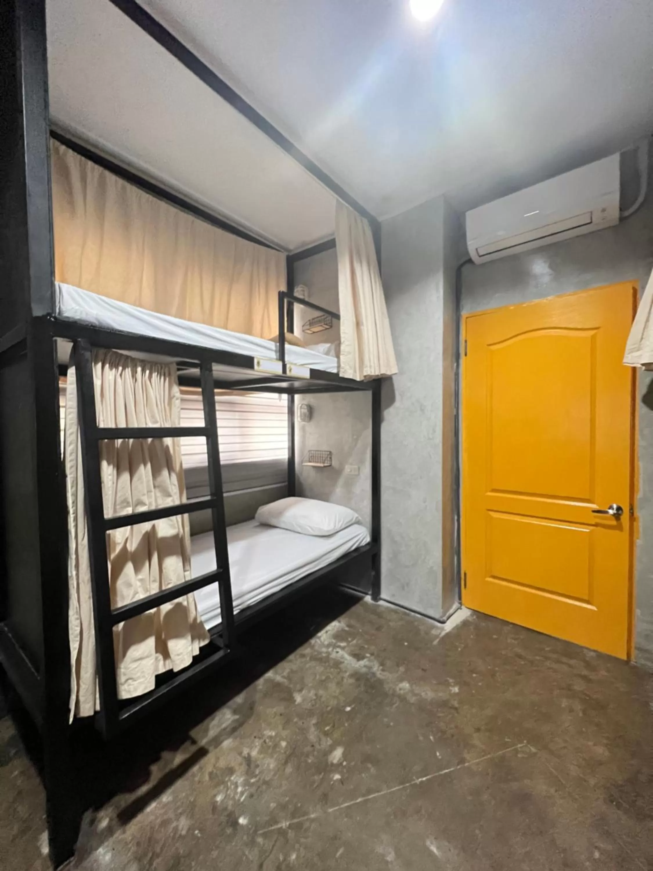 Photo of the whole room, Bed in HappyNest Hostel Cebu