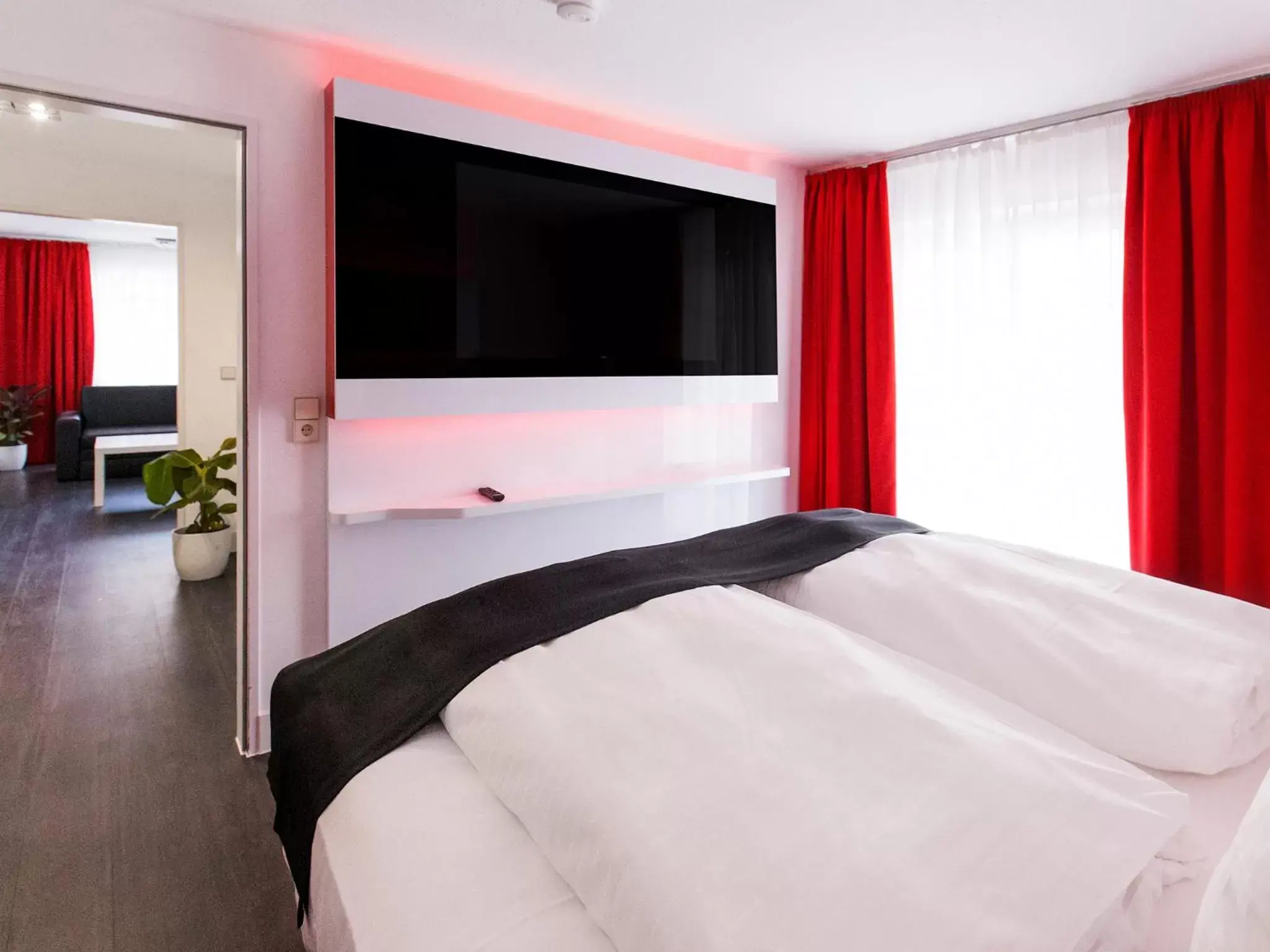 Photo of the whole room, Bed in DORMERO Hotel Villingen-Schwenningen