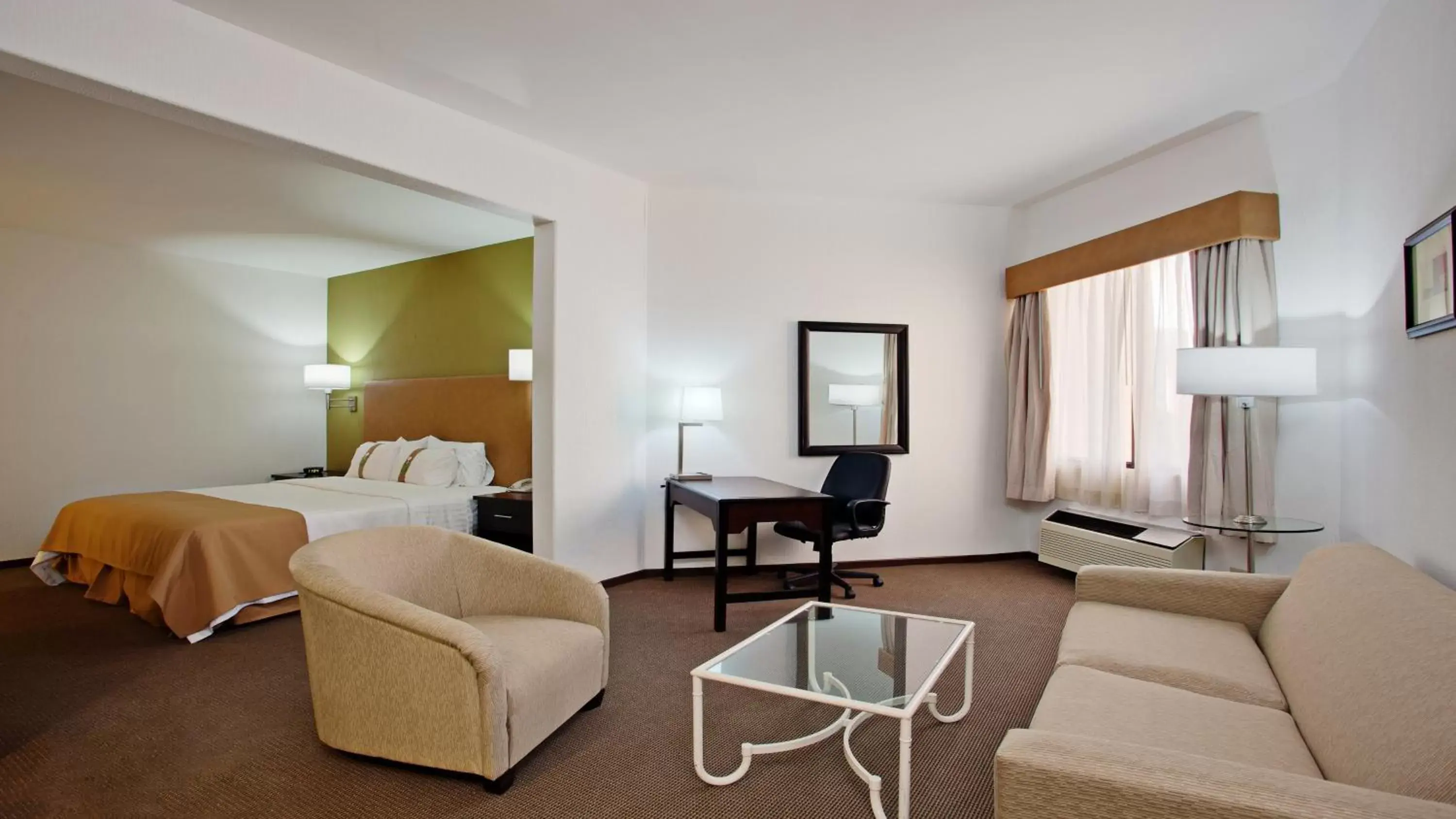Bedroom, Seating Area in Holiday Inn Tijuana Zona Rio, an IHG Hotel