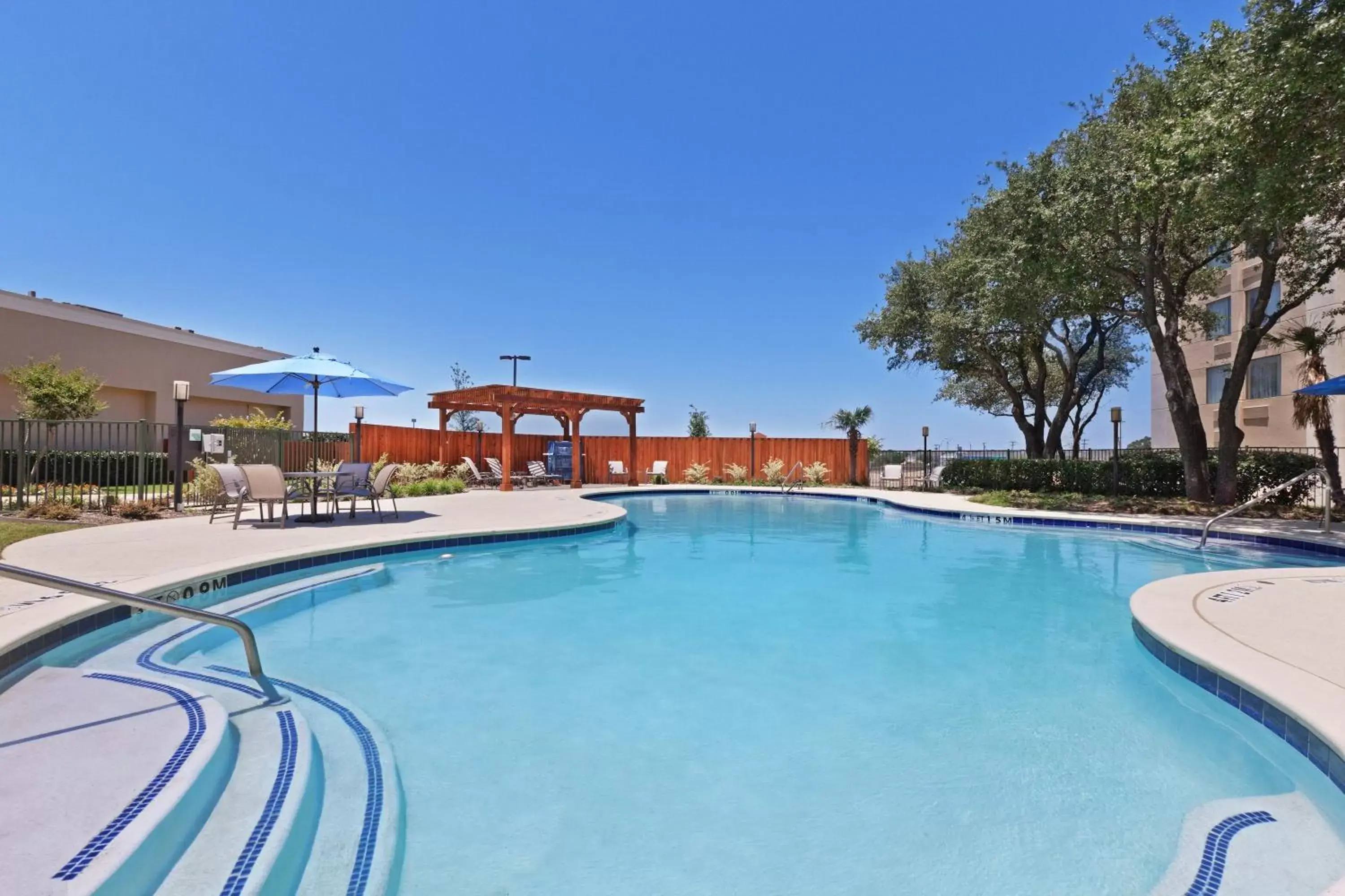 Swimming Pool in Holiday Inn Hotel Dallas DFW Airport West, an IHG Hotel