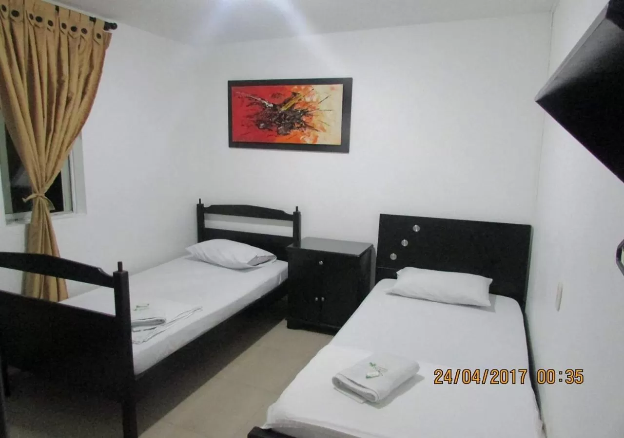 Bed in Hotel Palmeras De Mariana