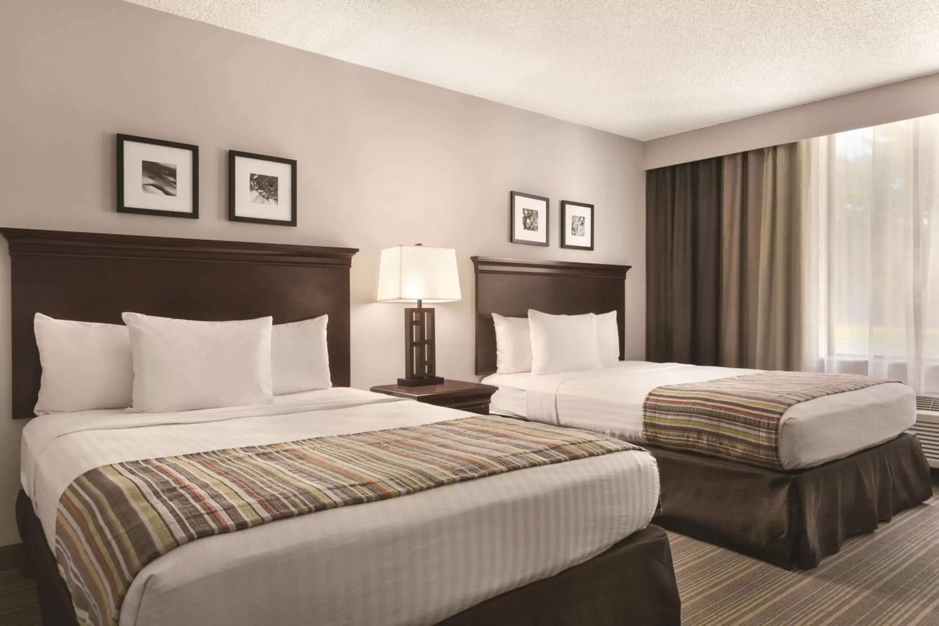 Photo of the whole room, Bed in Country Inn & Suites by Radisson, Traverse City, MI