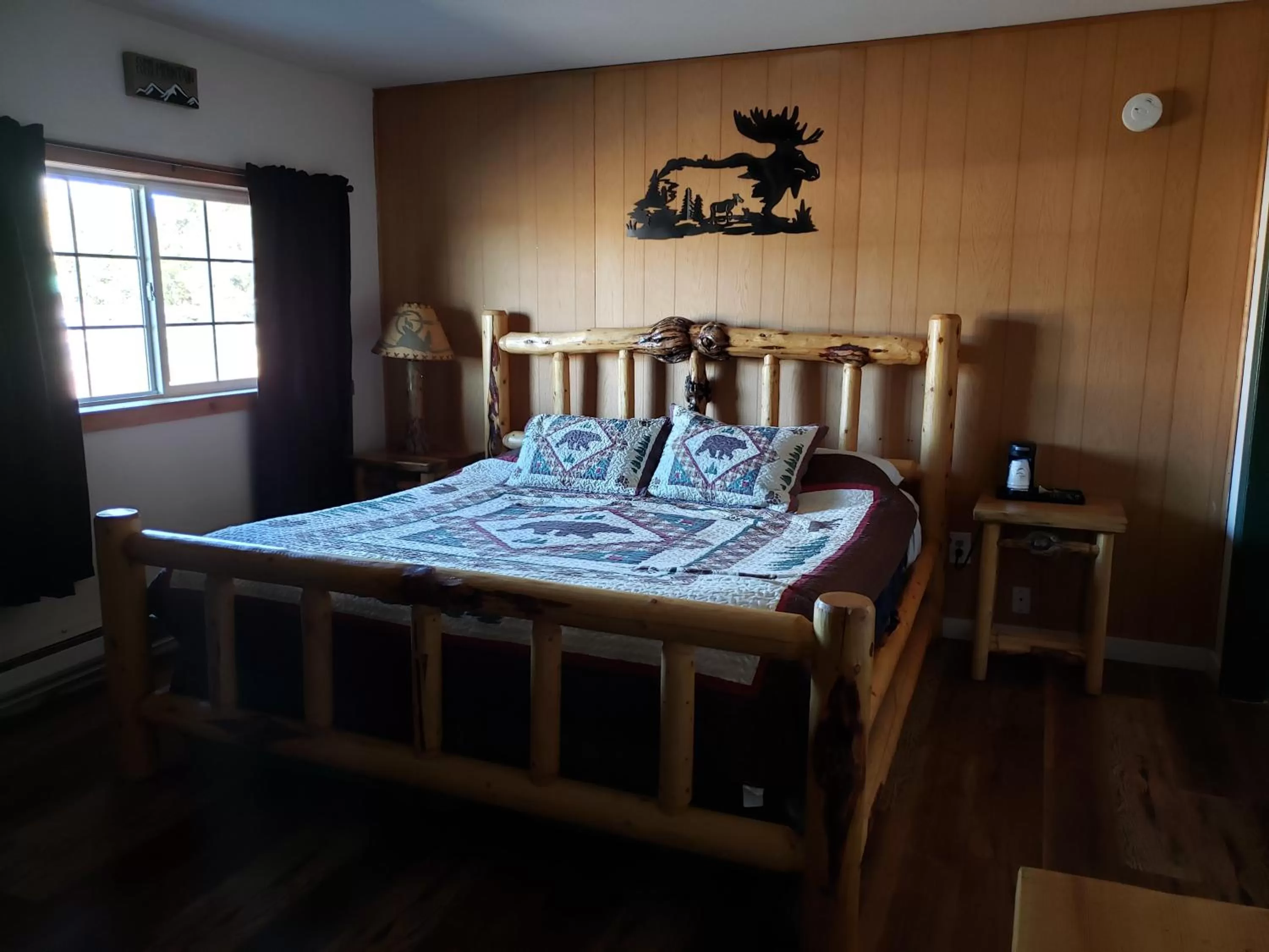 Bed in CRESCENT MOON MOTEL