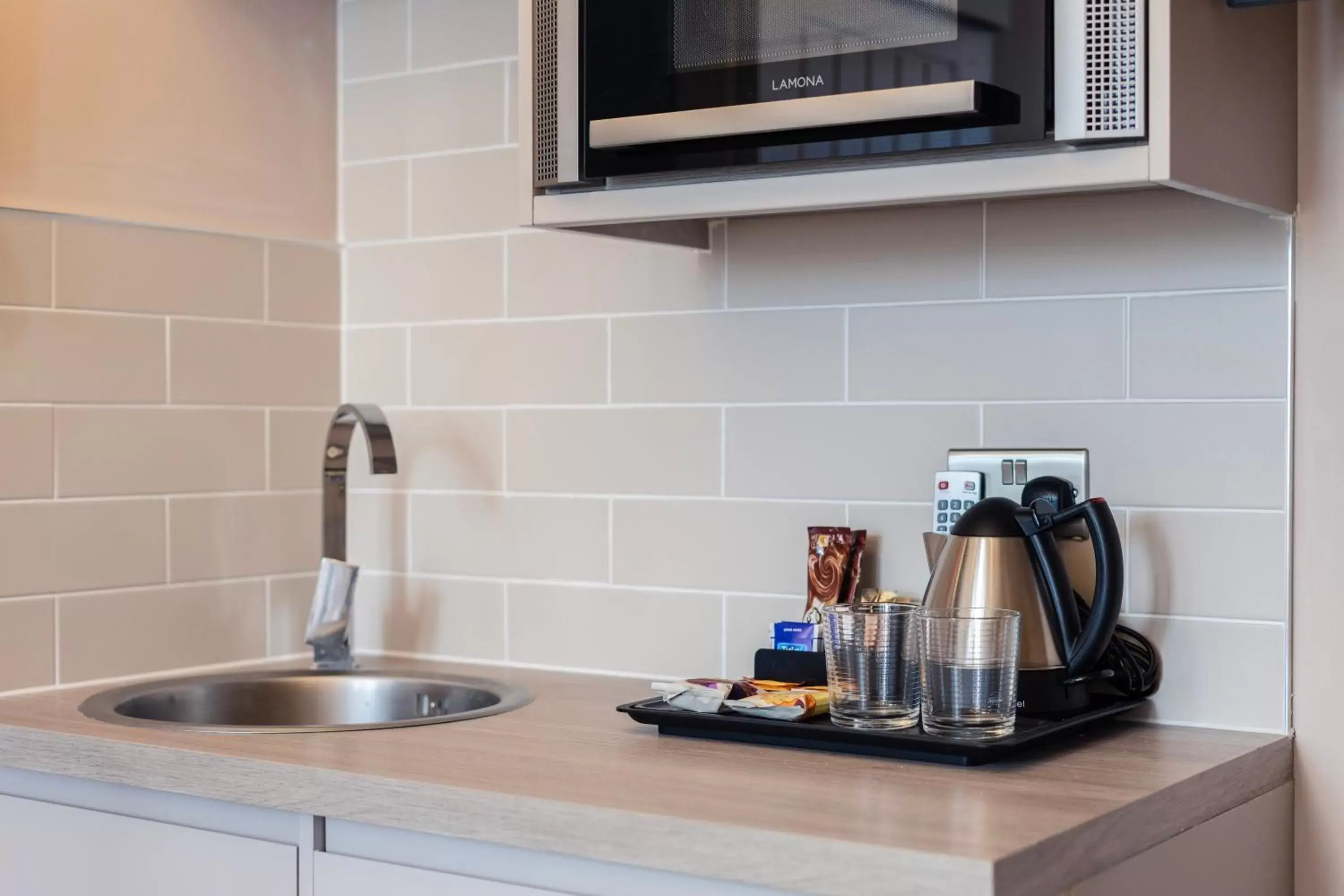 Kitchen/Kitchenette in Sweeney Apartments & Rooms