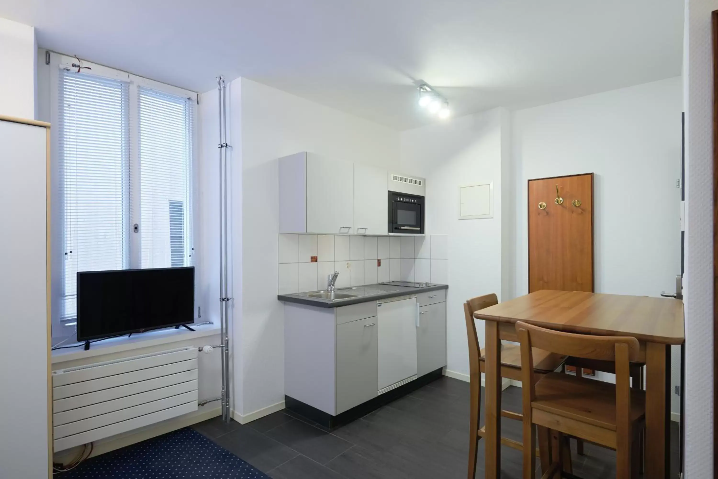 TV and multimedia, Kitchen/Kitchenette in Aparthotel Hine Adon Fribourg