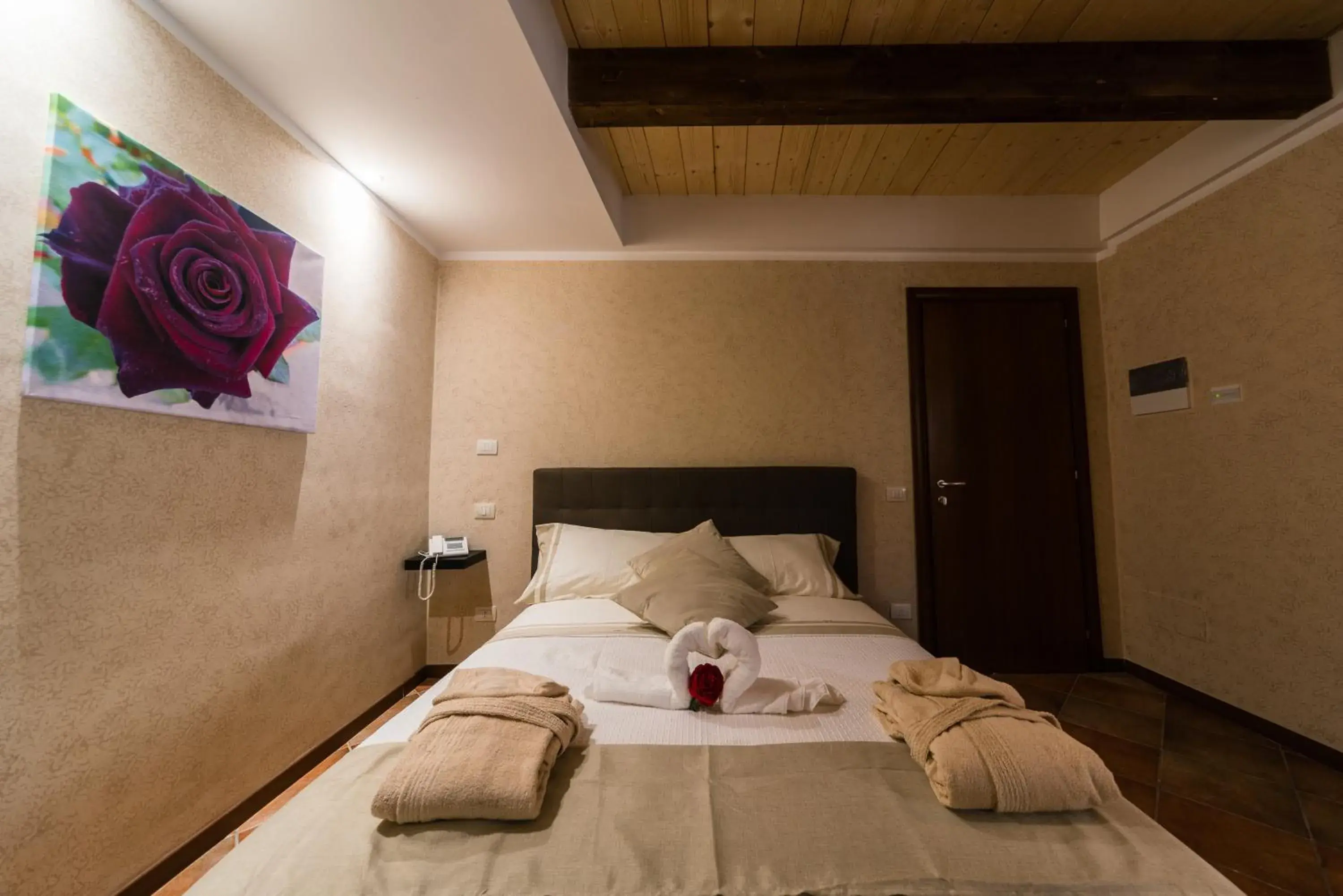 Bed in Le Undici Rose Hotel