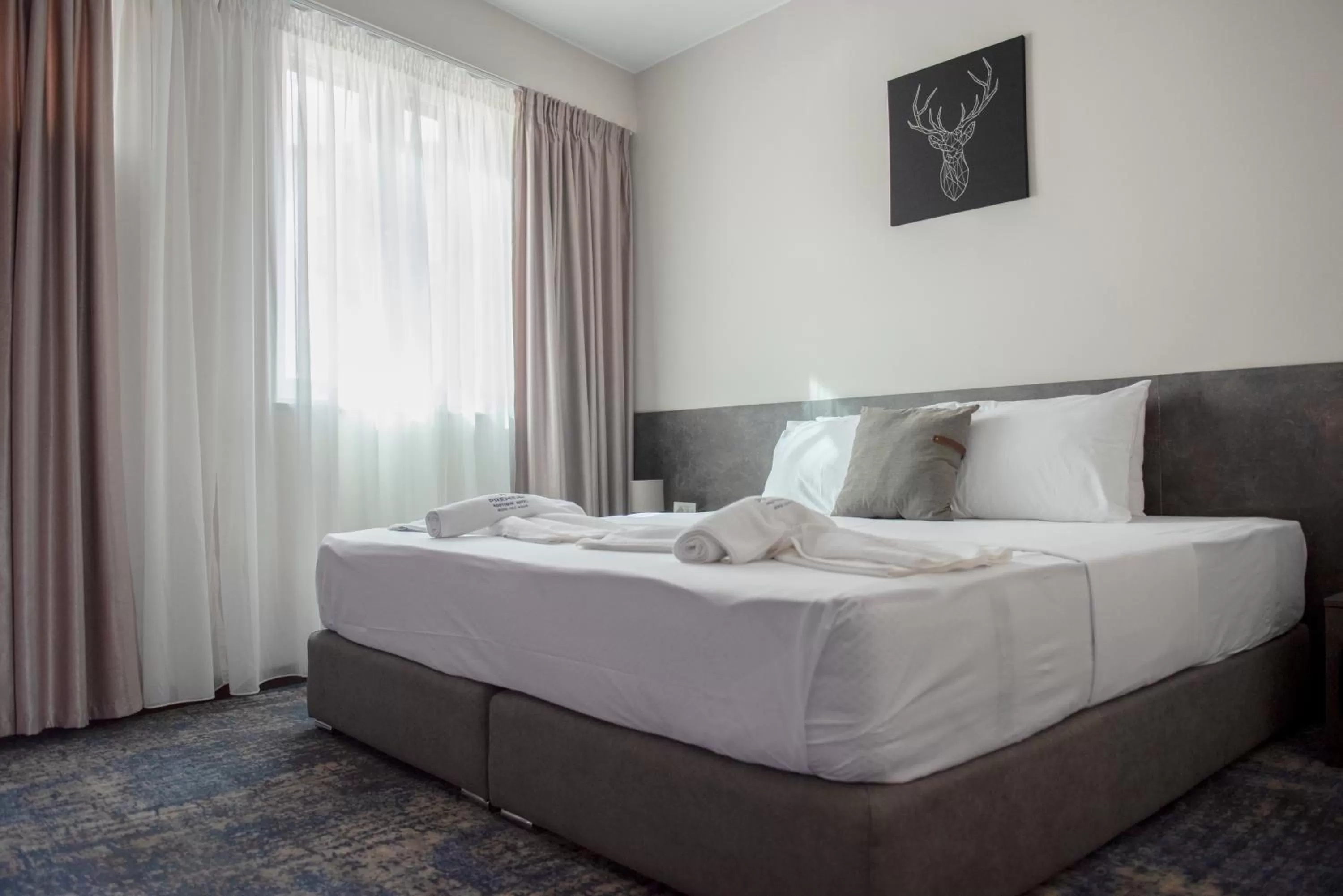 Bed in Hotel Premium