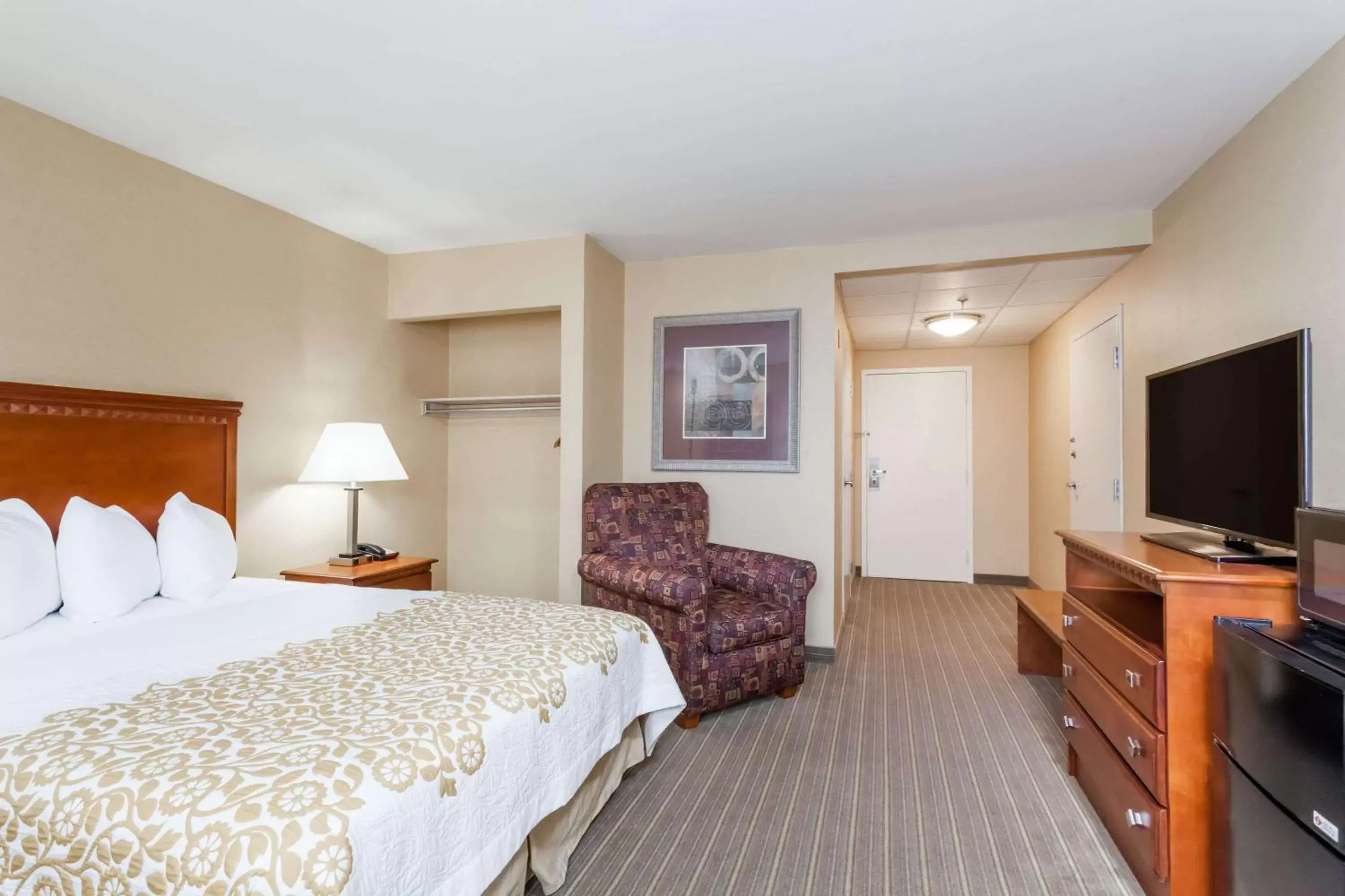 Photo of the whole room, TV/Entertainment Center in Days Inn by Wyndham Windsor Locks / Bradley Intl Airport