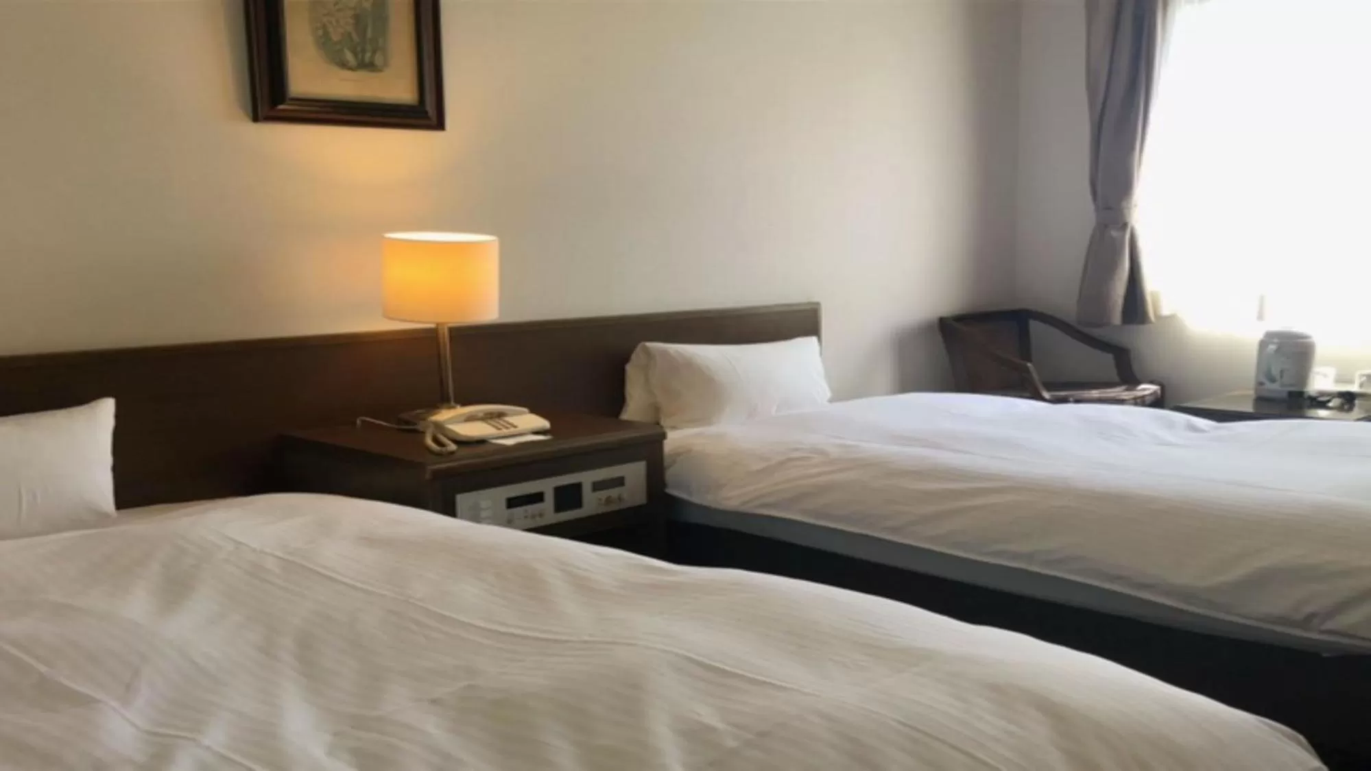 Bed in 小牧シティホテル