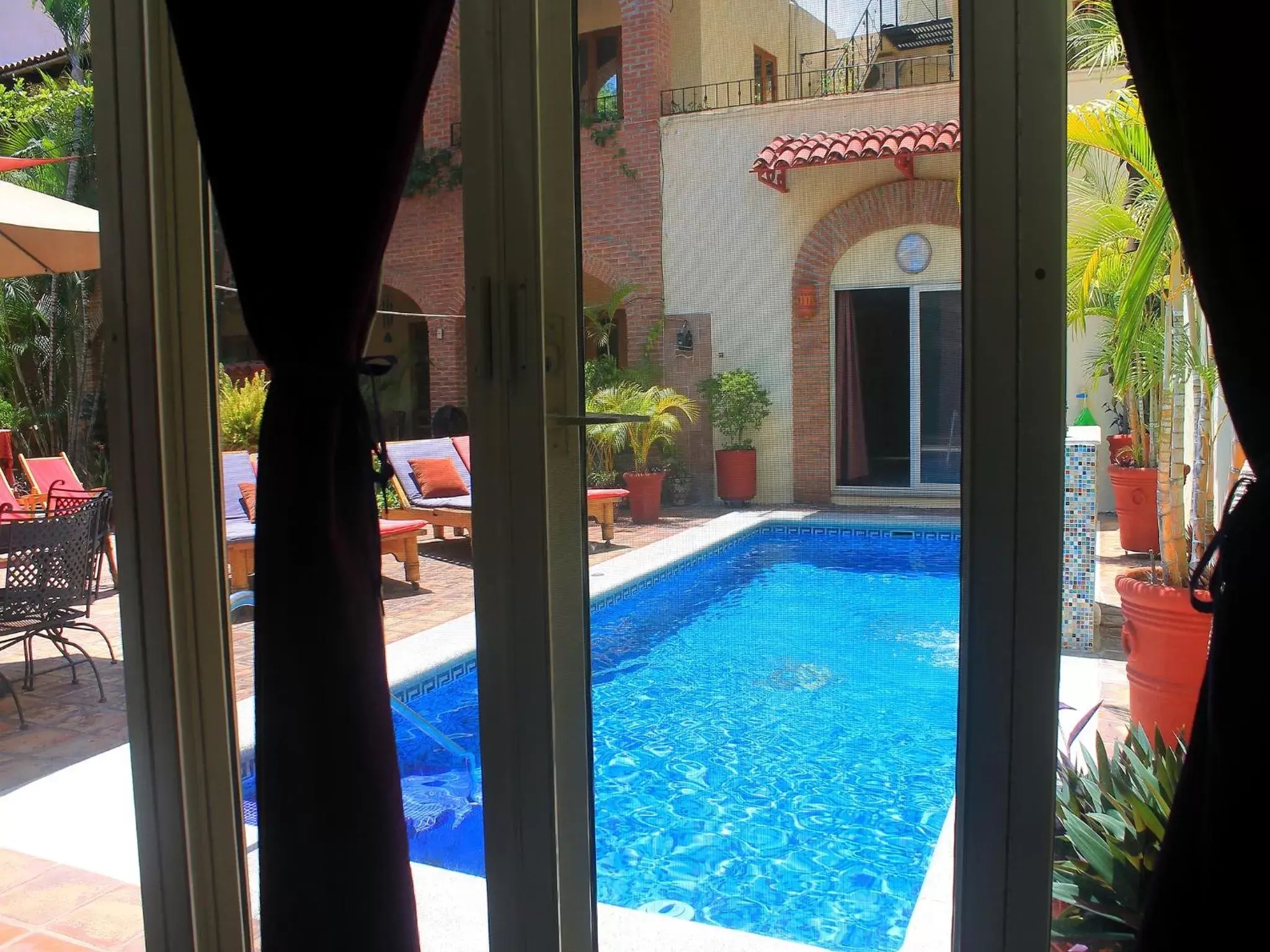 Living room, Pool View in Hacienda Escondida Puerto Vallarta