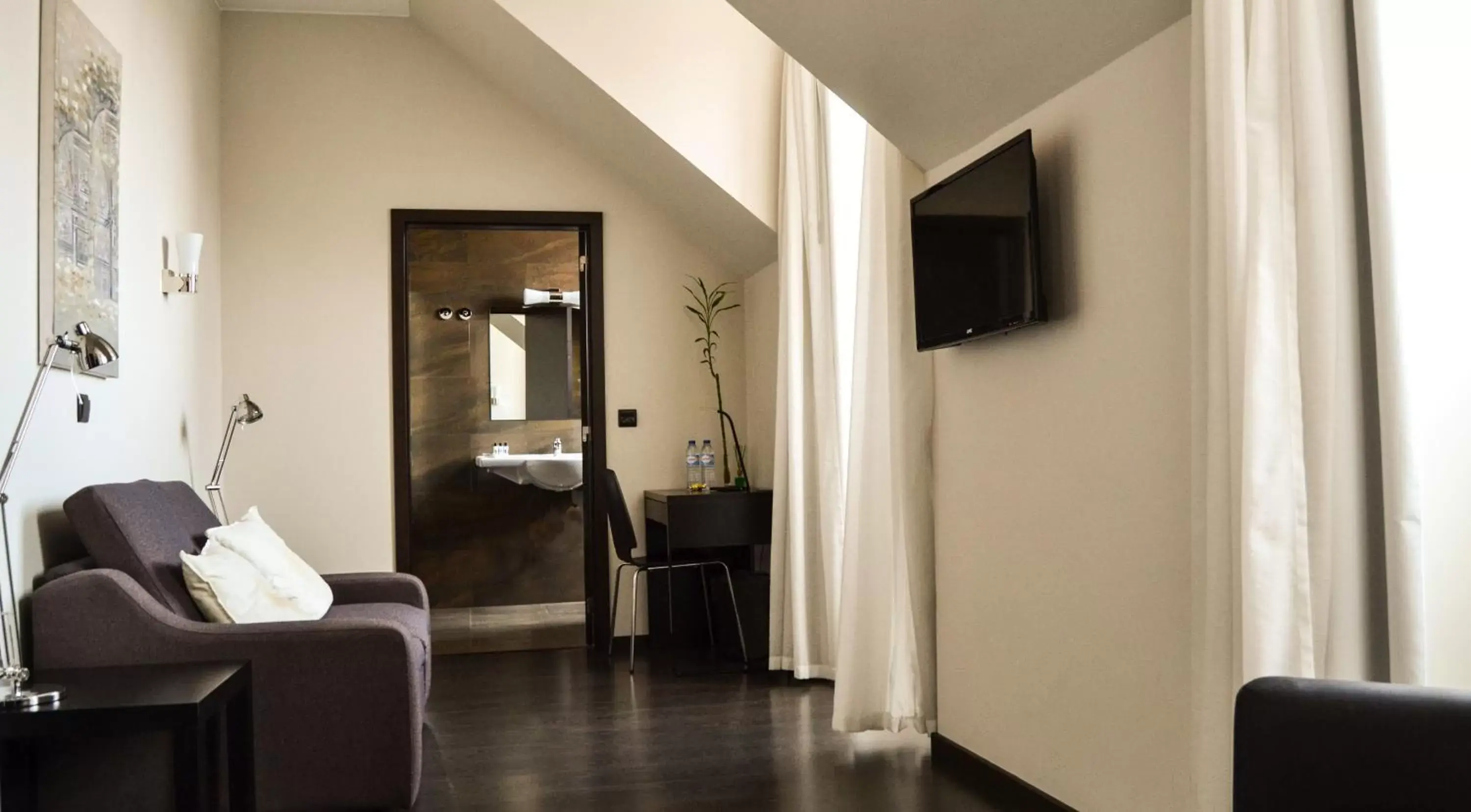 Living room, TV/Entertainment Center in Rossio Garden Hotel