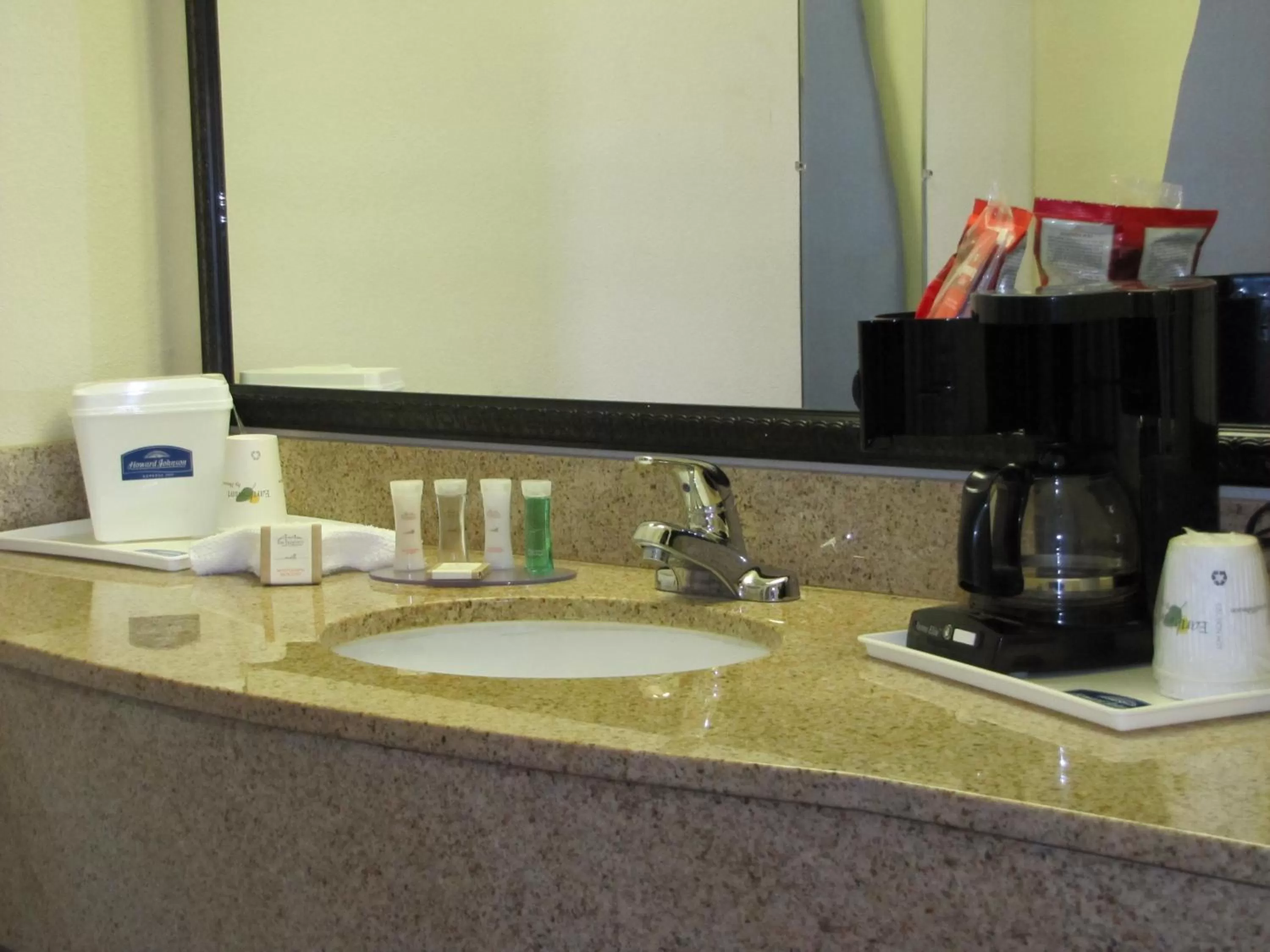 Bathroom in Howard Johnson by Wyndham Tallahassee