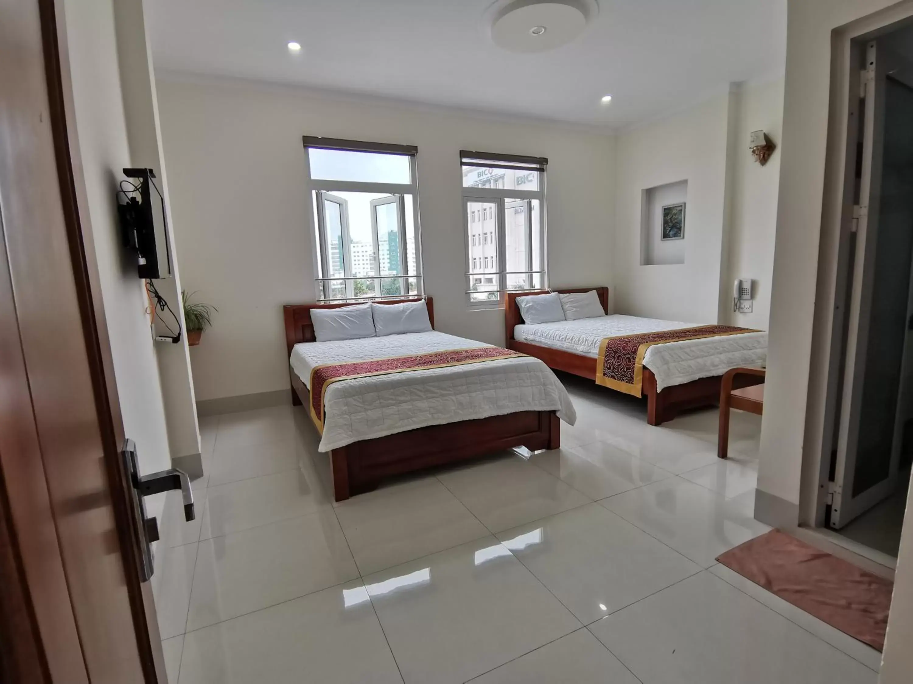 Double Room with Two Double Beds in An Ngân Phú Hotel Double Room with Two Double Beds in An Ngân Phú Hotel