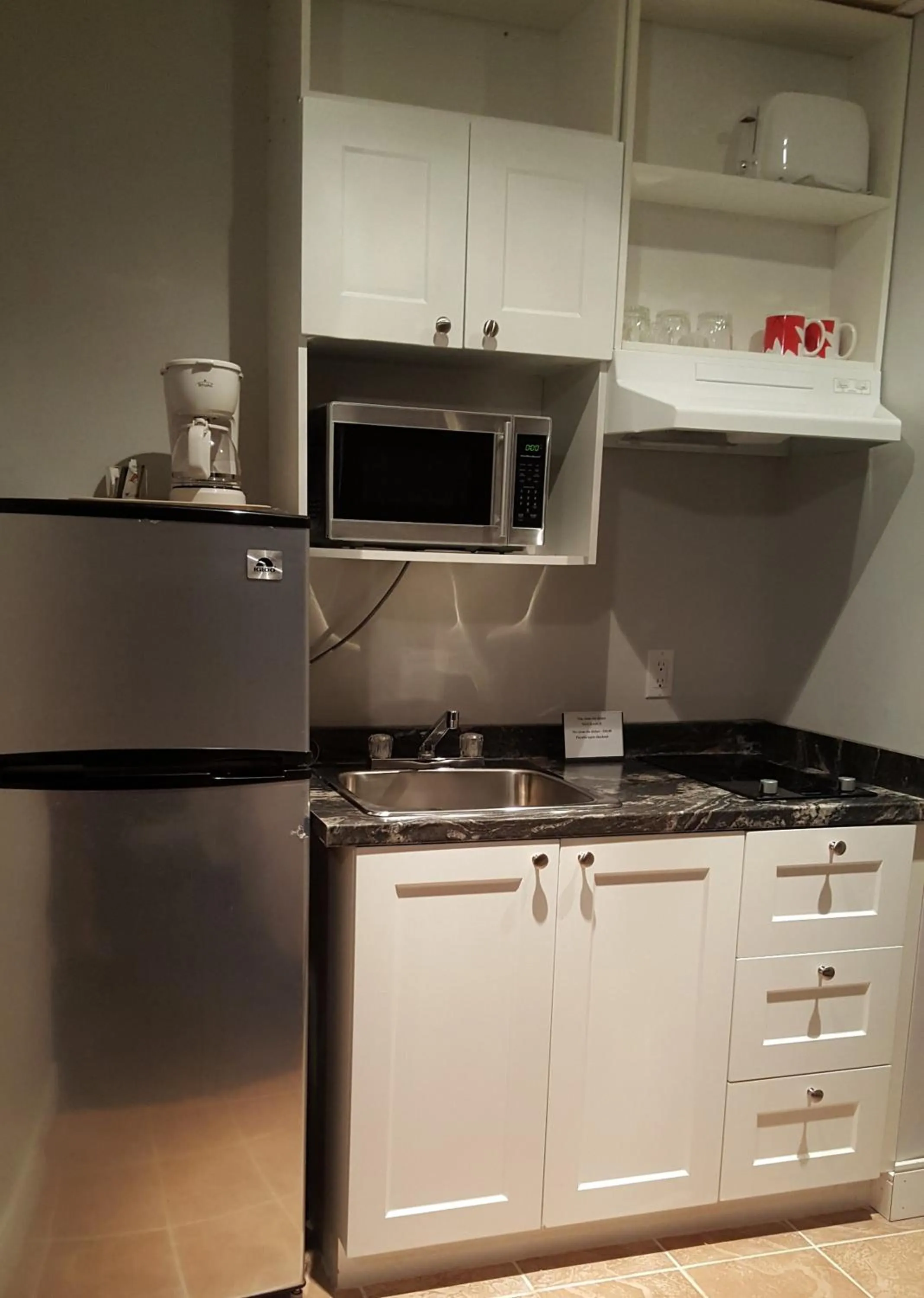 Kitchen or kitchenette in Centennial Motel