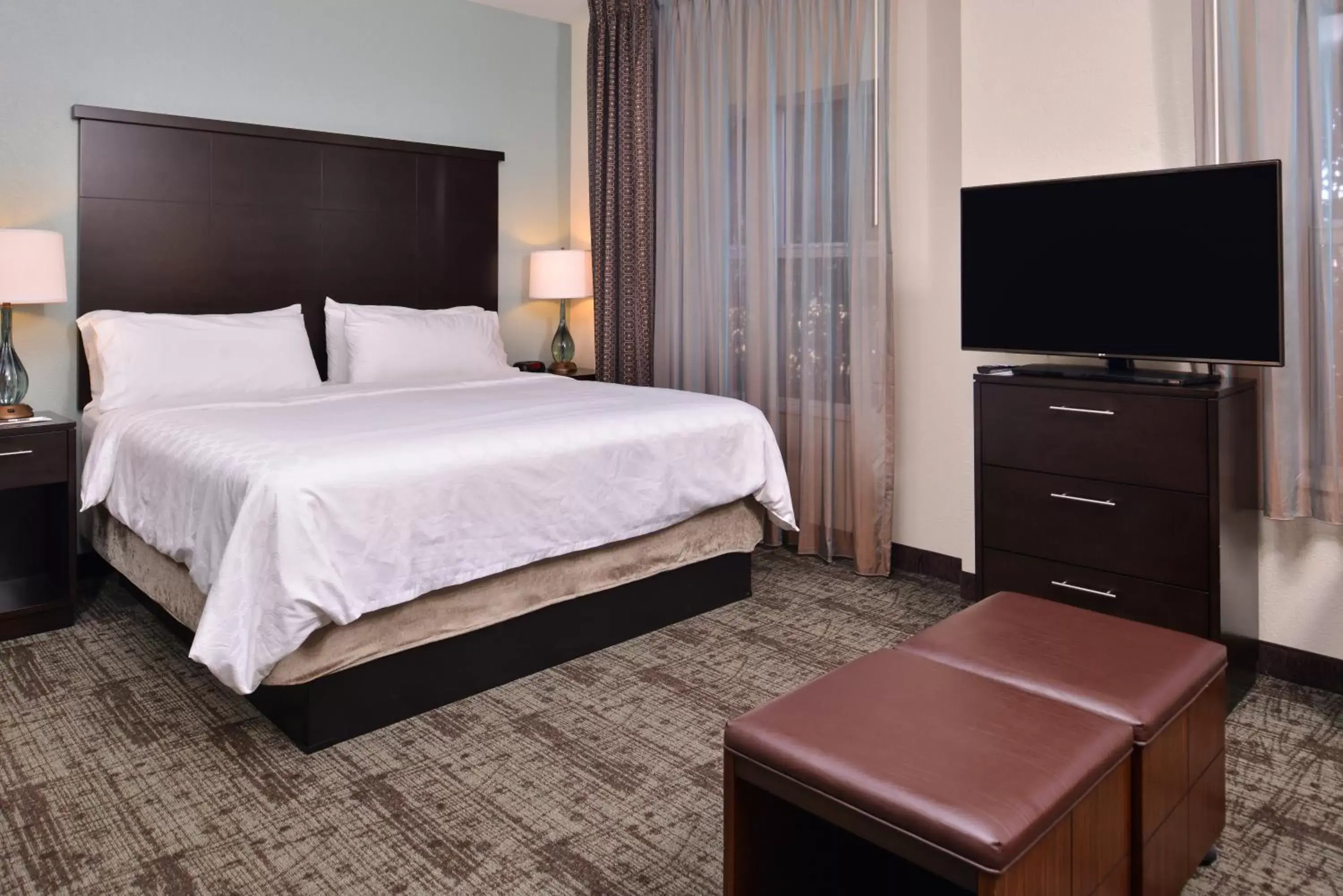 Photo of the whole room, Bed in Staybridge Suites Wichita Falls, an IHG Hotel