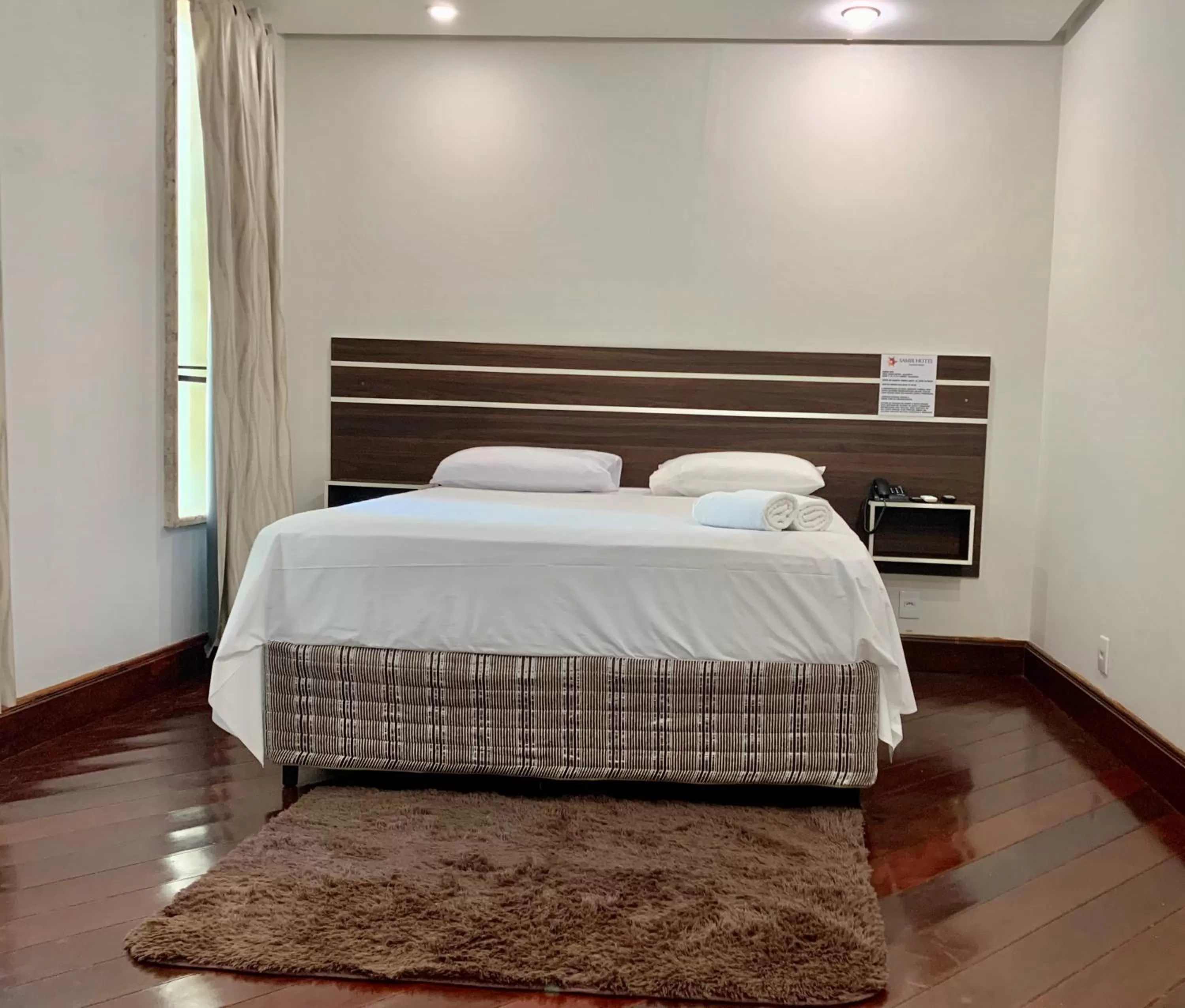 Bed in SAMIR HOTEL COMFORT