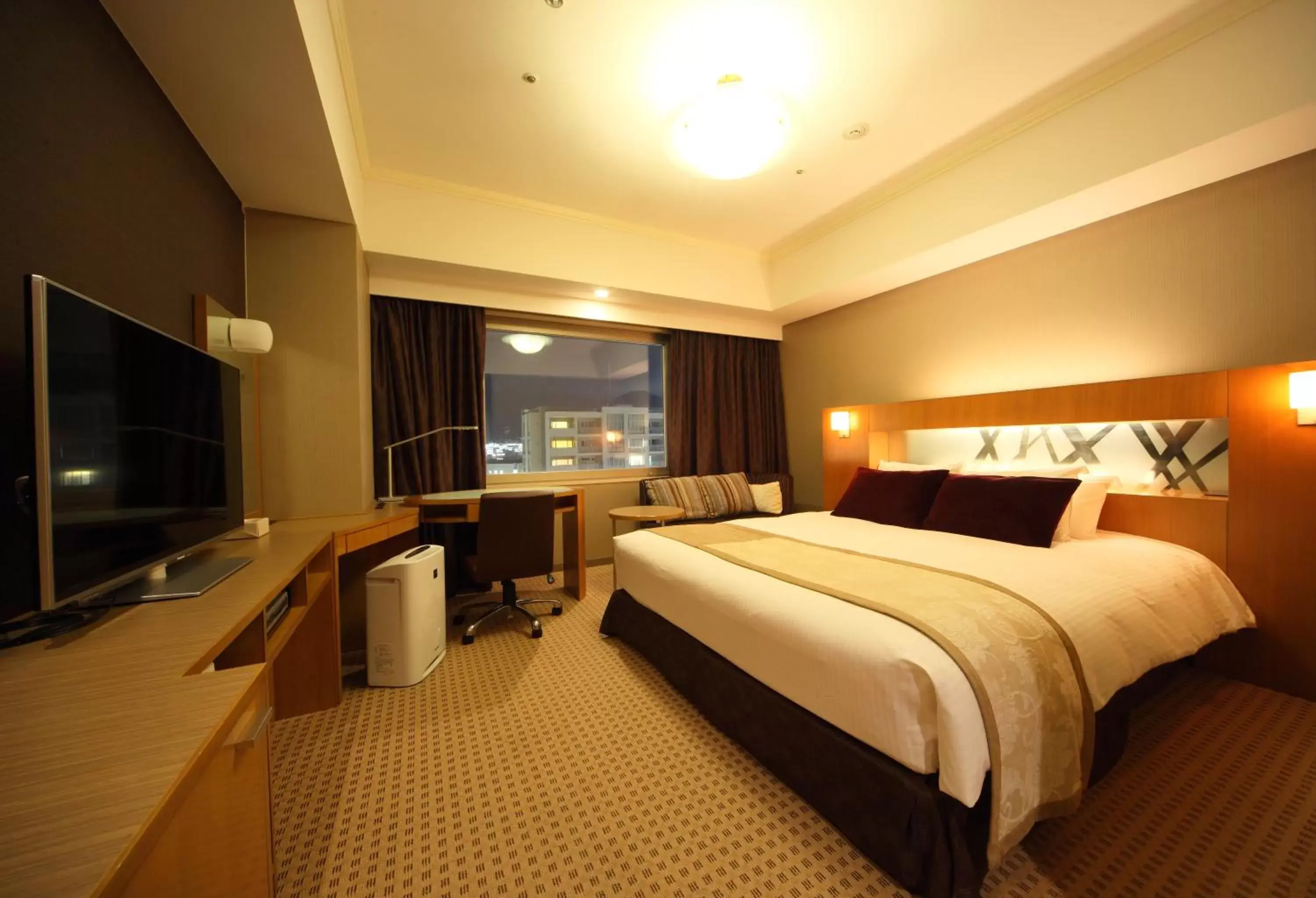 Bed in Hotel Metropolitan Nagano