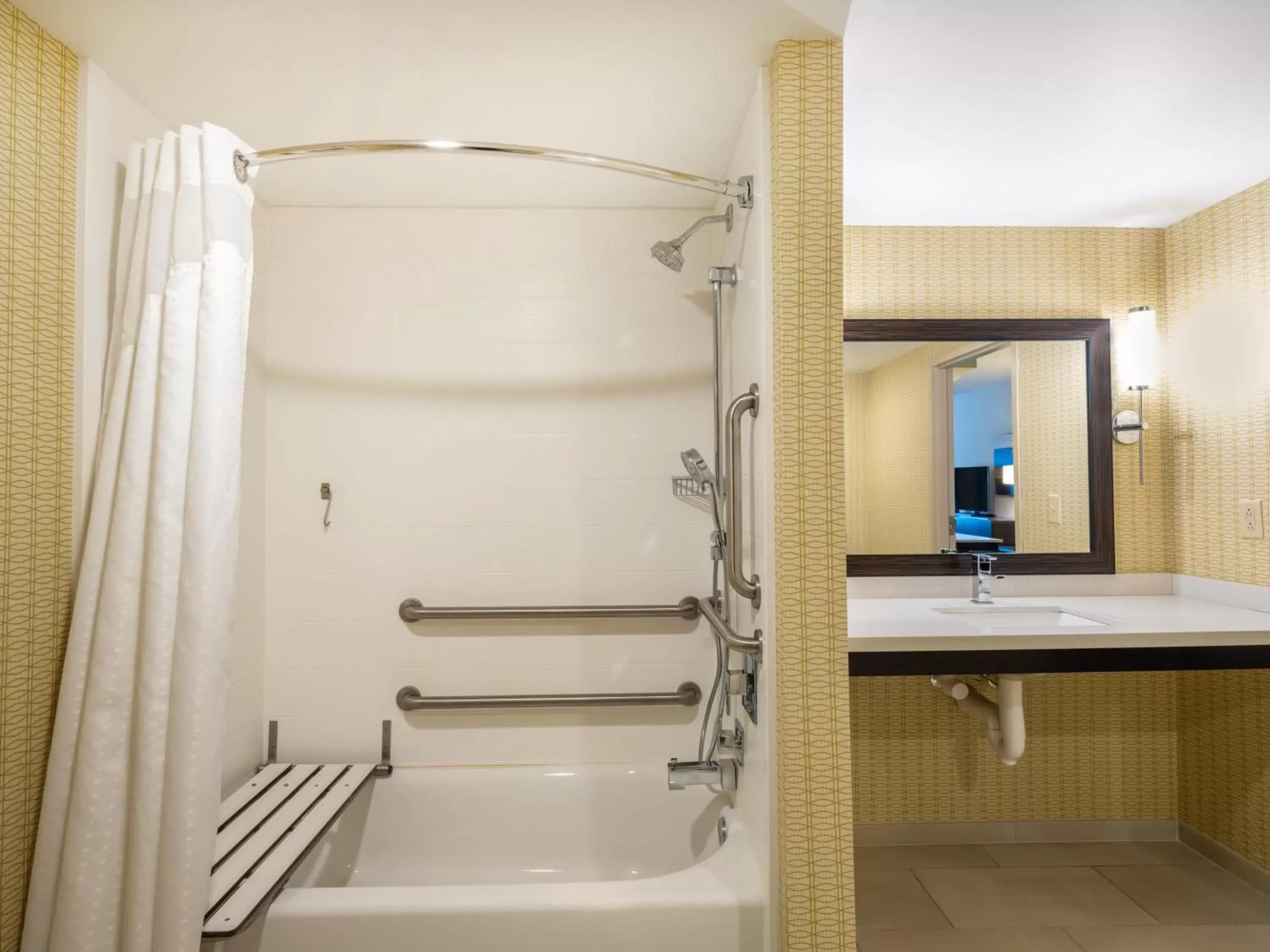 Bathroom in Holiday Inn Greensboro Coliseum, an IHG Hotel