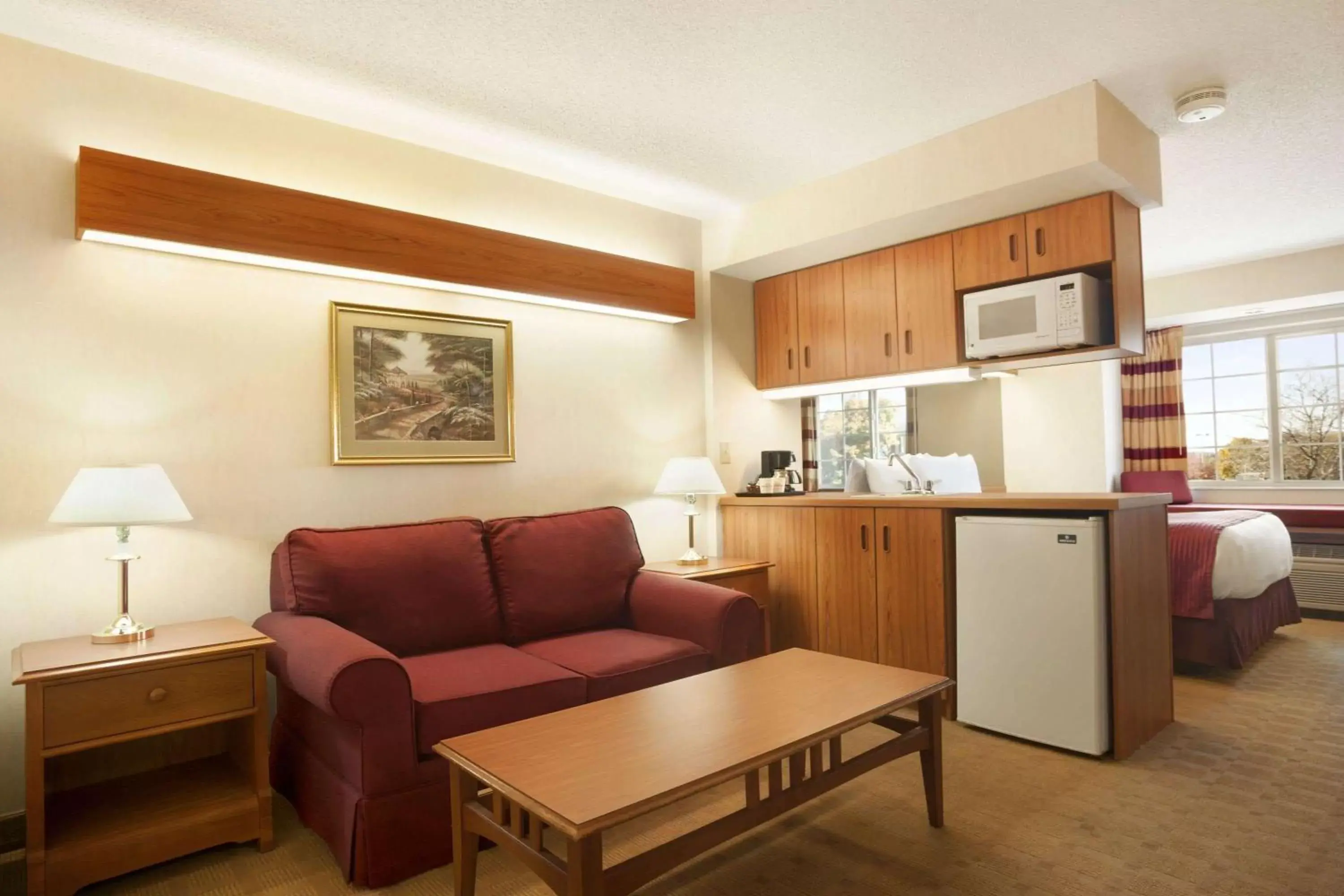 Photo of the whole room, Kitchen/Kitchenette in Microtel Inn & Suites by Wyndham Ann Arbor