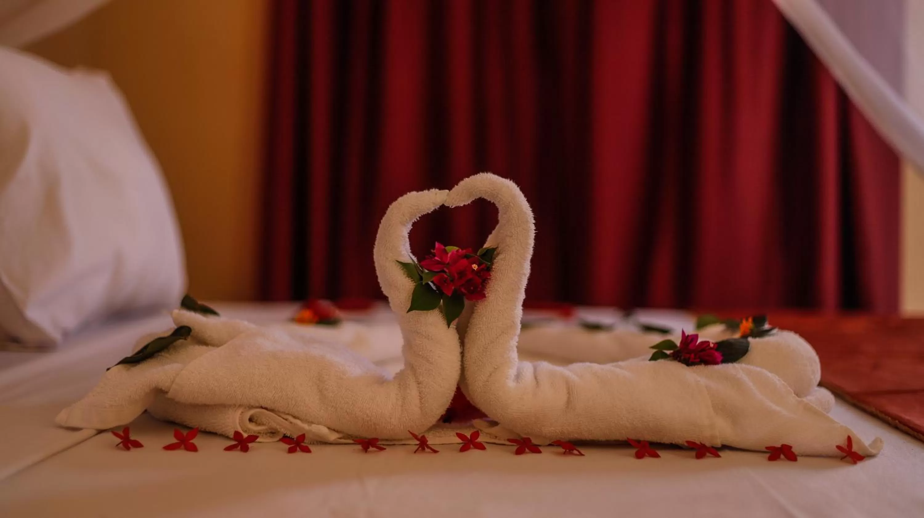 Bed in Amaan Beach Bungalows