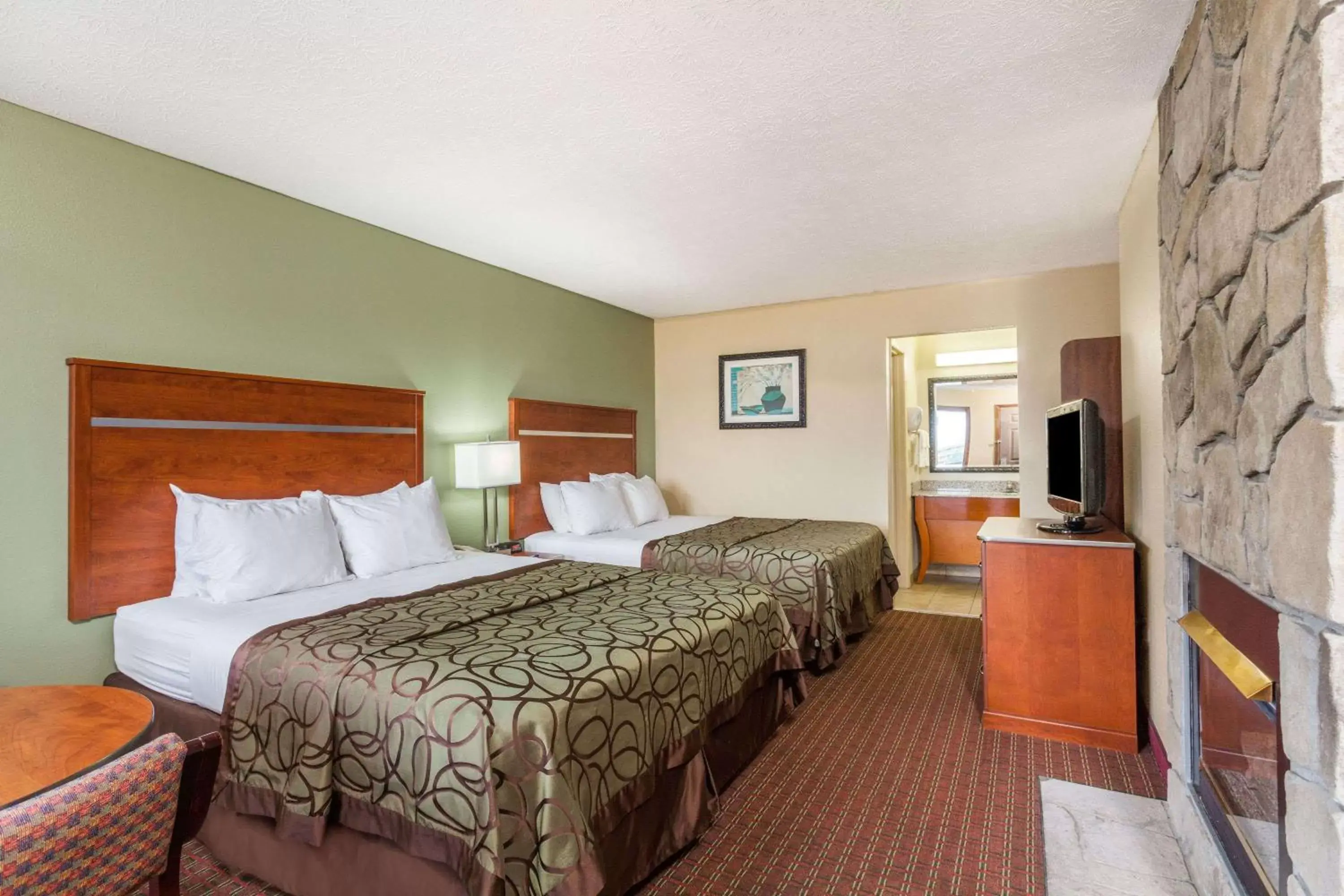 Photo of the whole room, Bed in Baymont by Wyndham Pigeon Forge near Island Drive