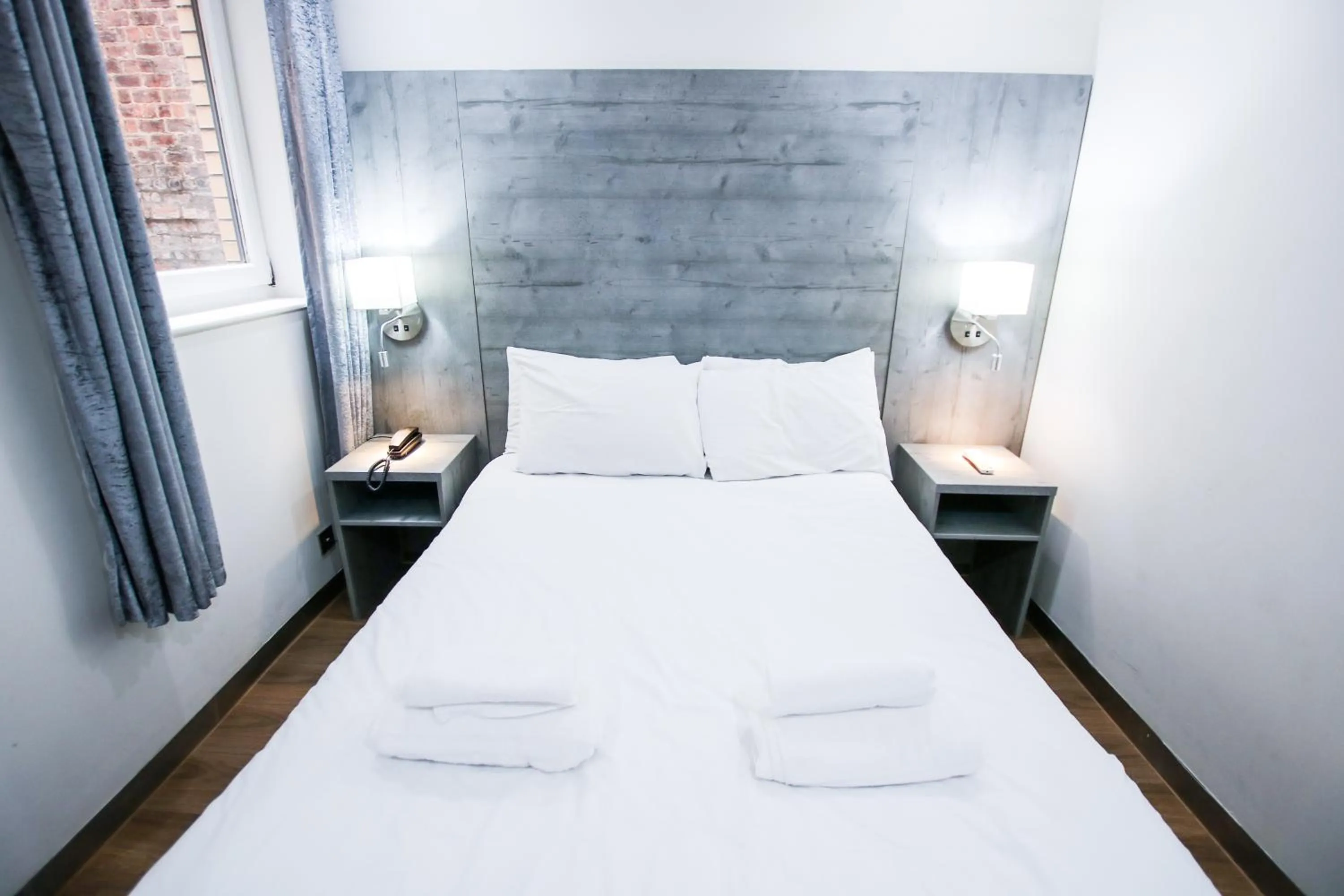 Bed in Brunswick Merchant City Hotel