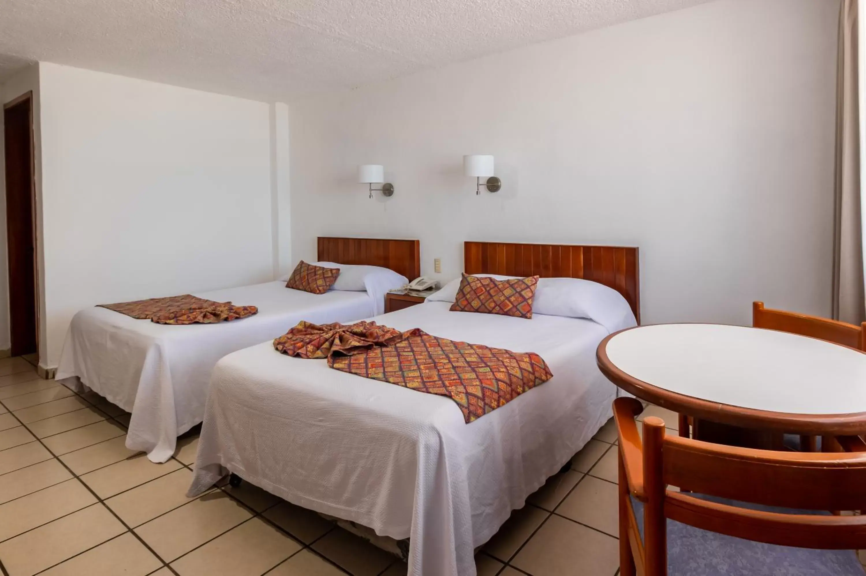 Bedroom, Bed in Costa de Oro Beach Hotel