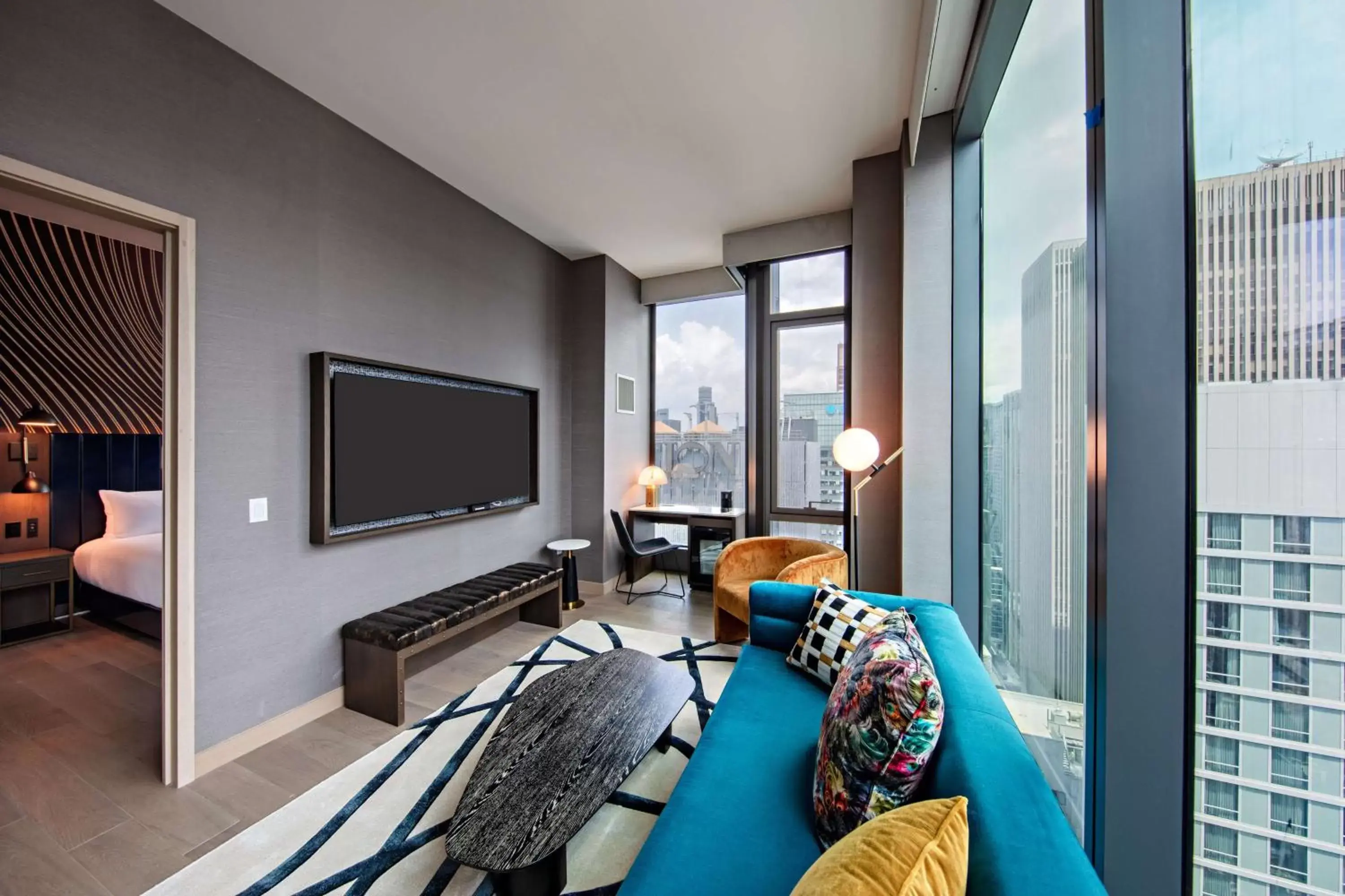 Living room, Seating Area in Tempo By Hilton New York Times Square