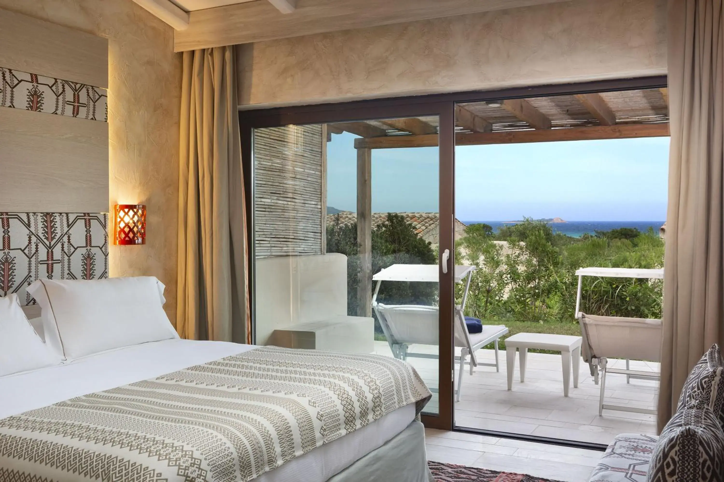 Bedroom, Bed in Baglioni Resort Sardinia - The Leading Hotels of the World Bedroom, Bed in Baglioni Resort Sardinia - The Leading Hotels of the World