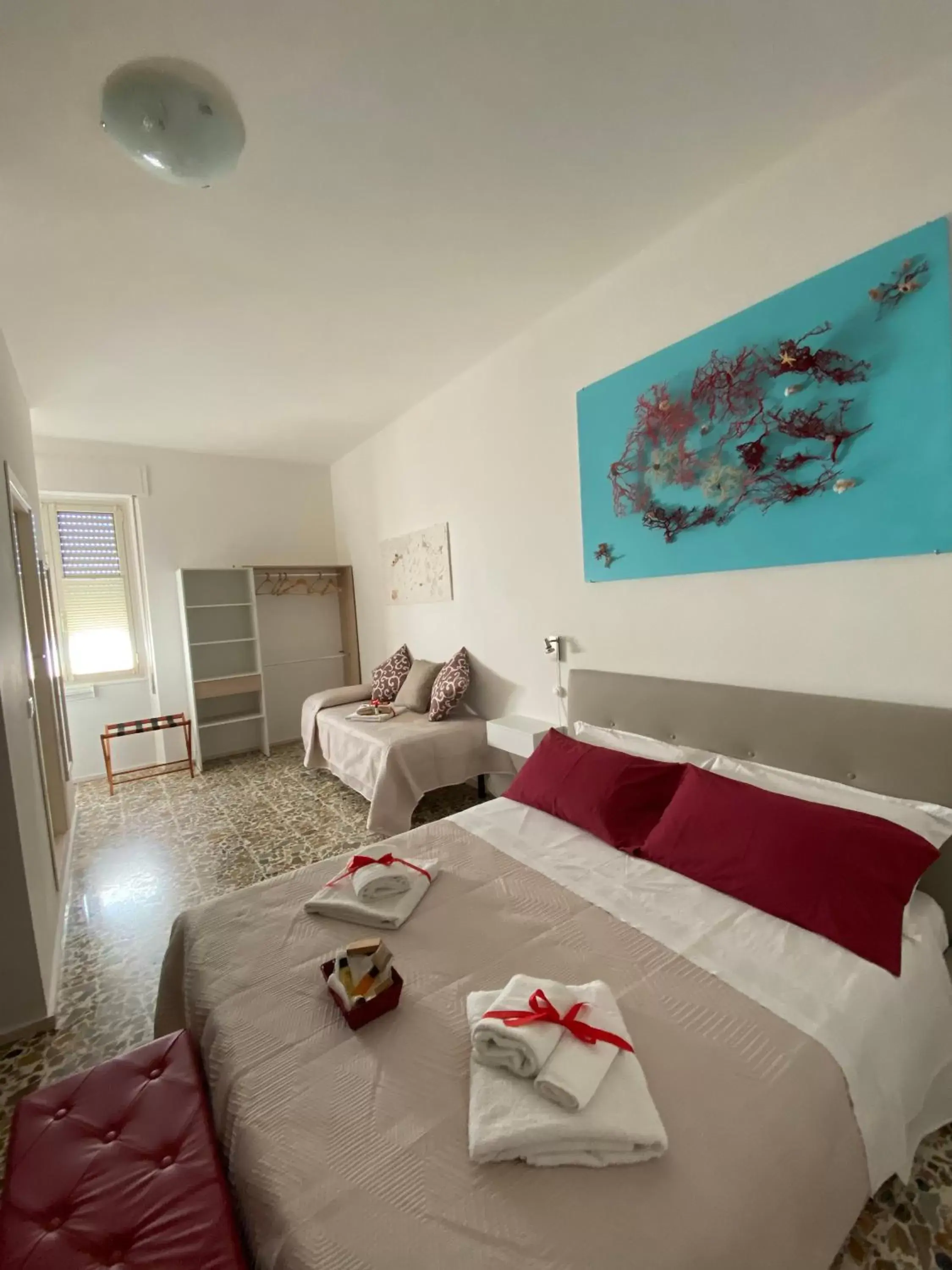 Triple Room with Private Bathroom in Rossocorallo Rooms