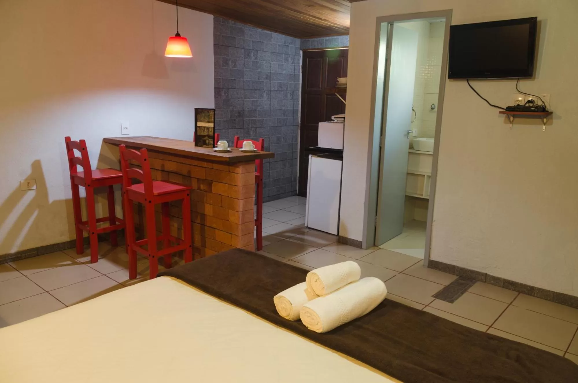 Bed in Pousada Ilha da Magia