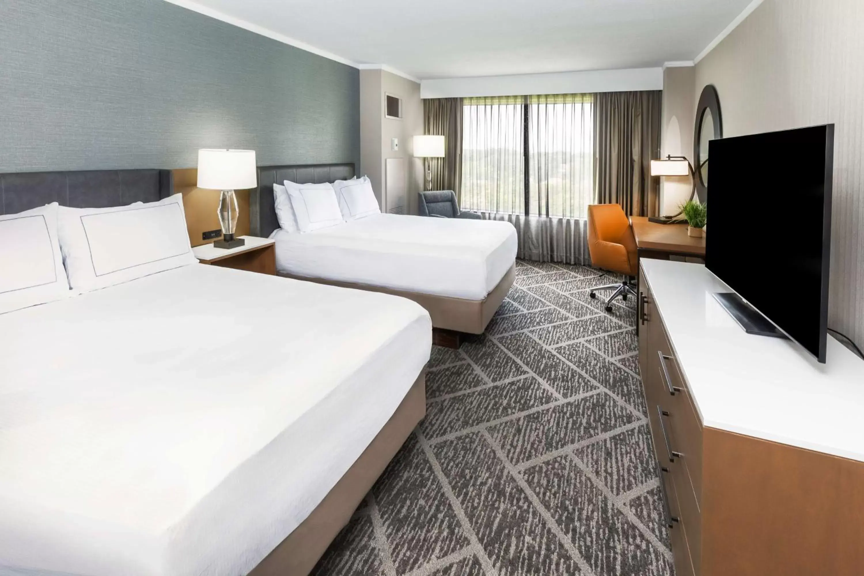 Bed in DoubleTree by Hilton Tulsa at Warren Place