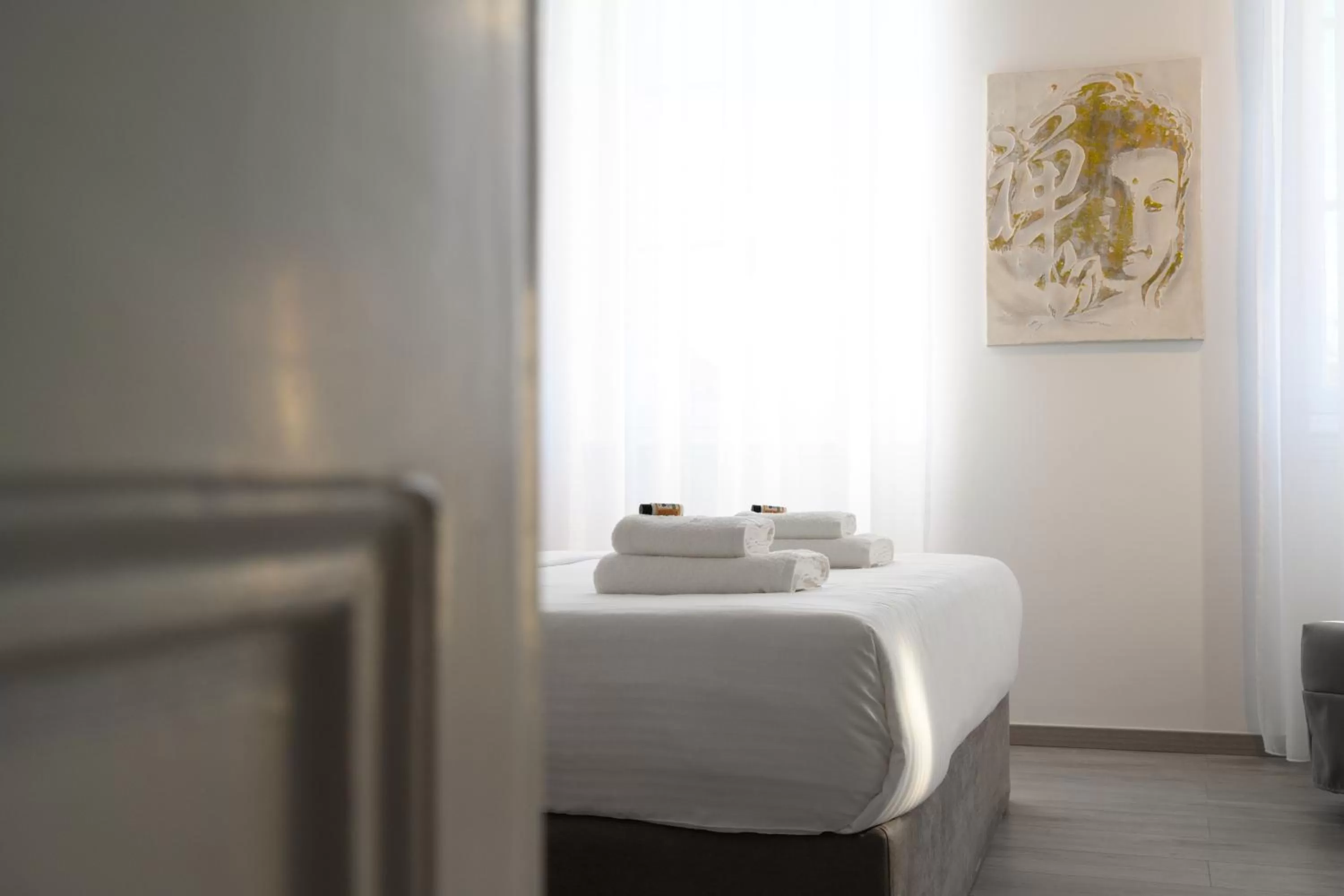 Bed in AMALPHI Corfu City Living