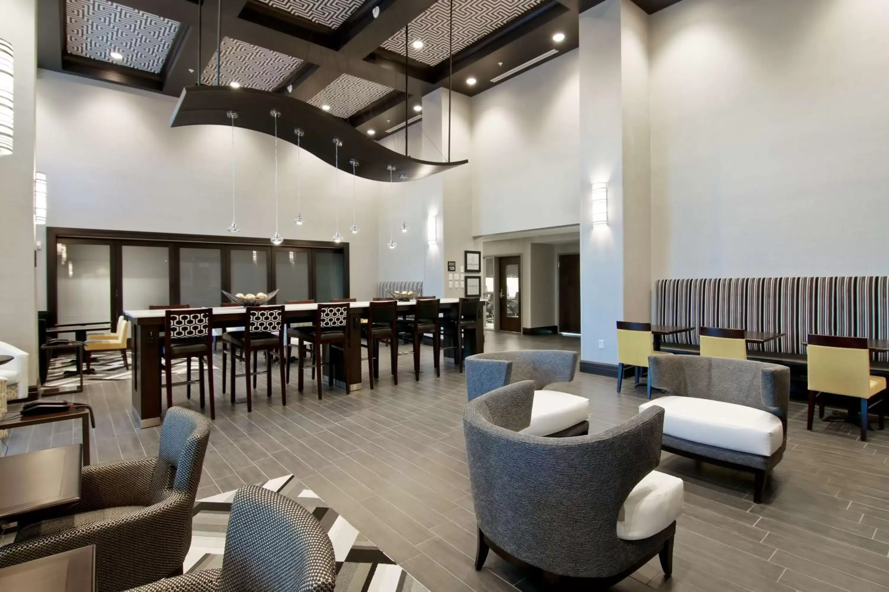 Lobby or reception in Hampton Inn & Suites Bellevue Downtown/Seattle Lobby or reception in Hampton Inn & Suites Bellevue Downtown/Seattle