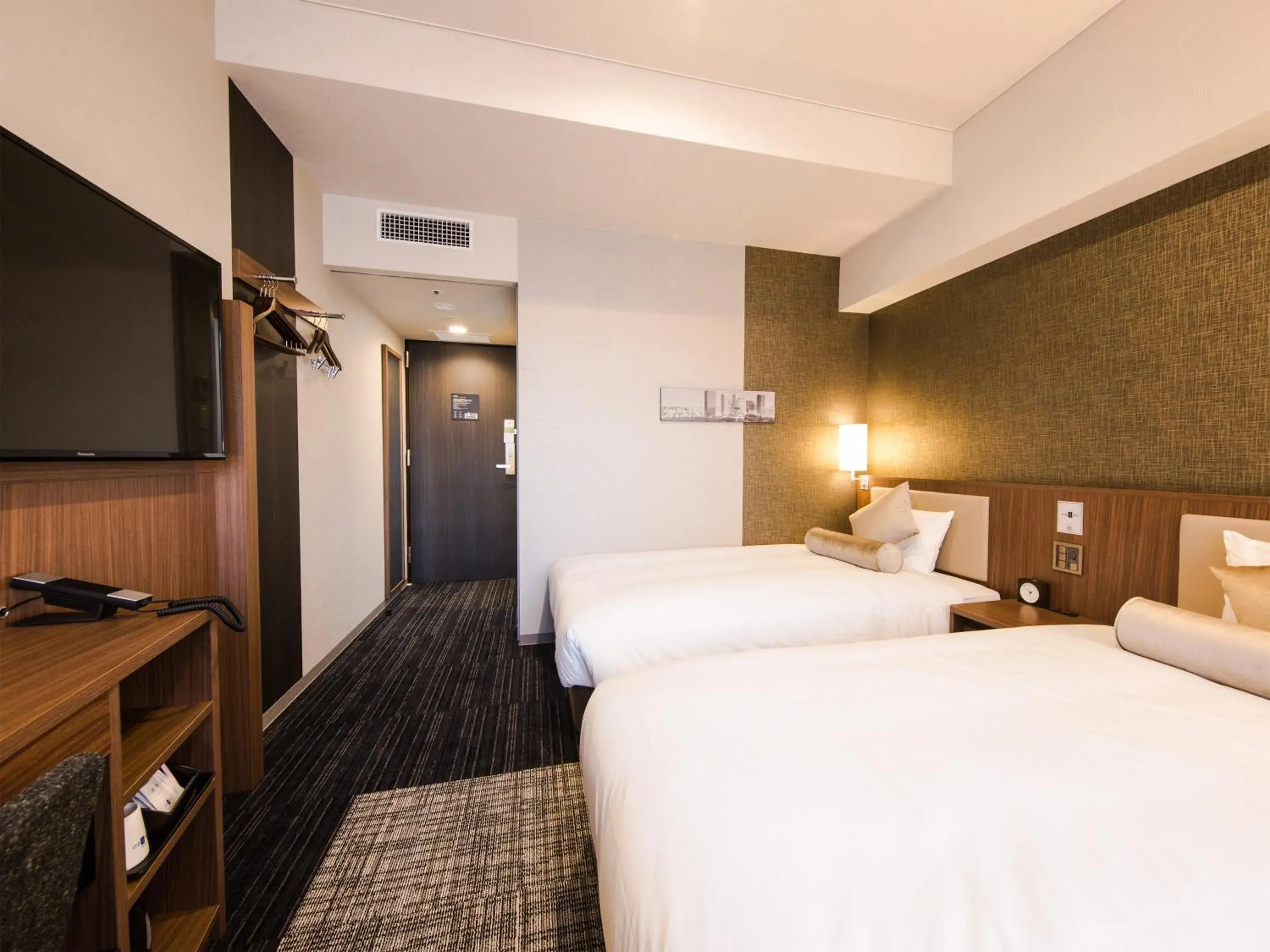 Photo of the whole room, Bed in HOTEL UNIZO Yokohamaeki-West