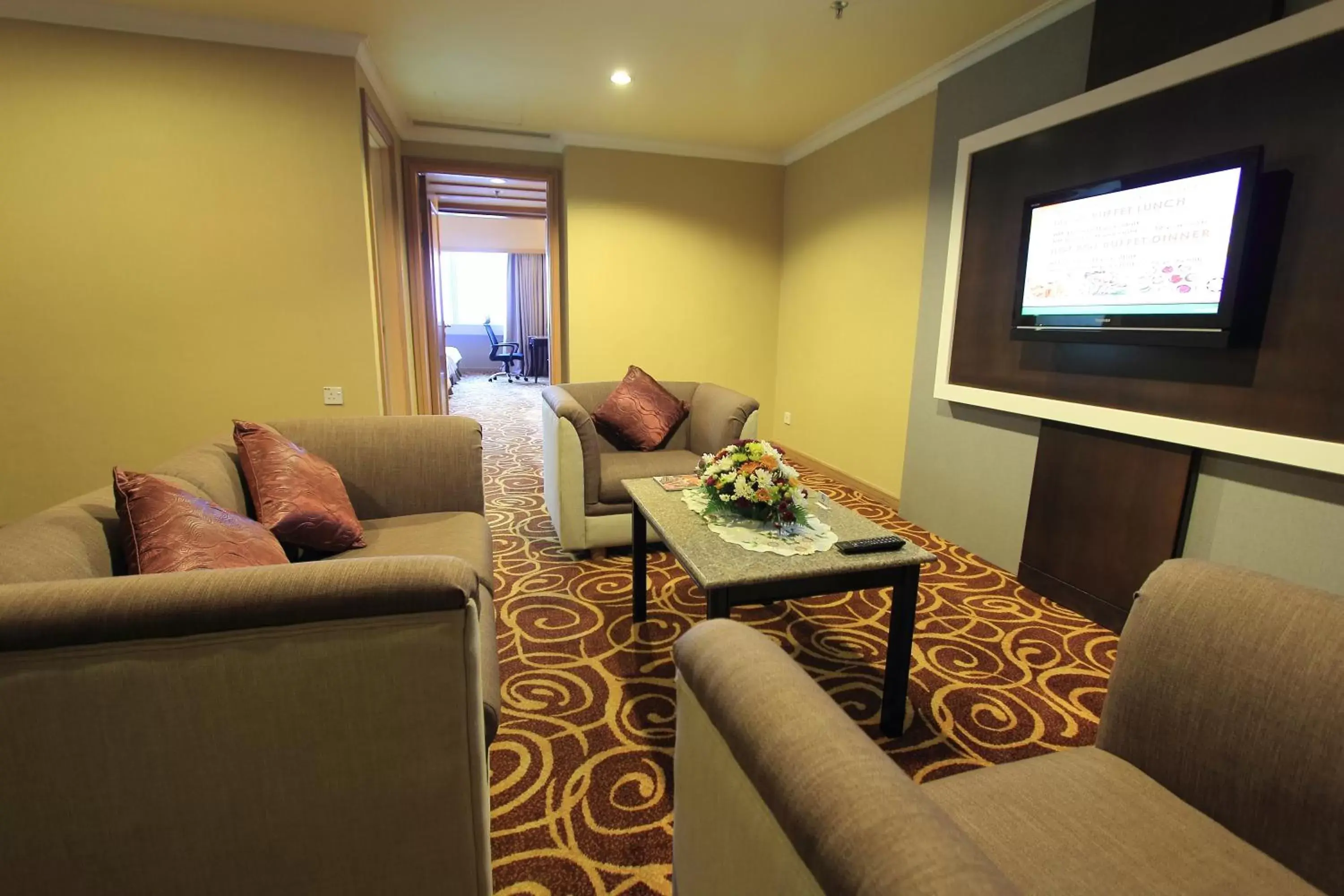 Communal lounge/ TV room, Seating Area in Mega Hotel