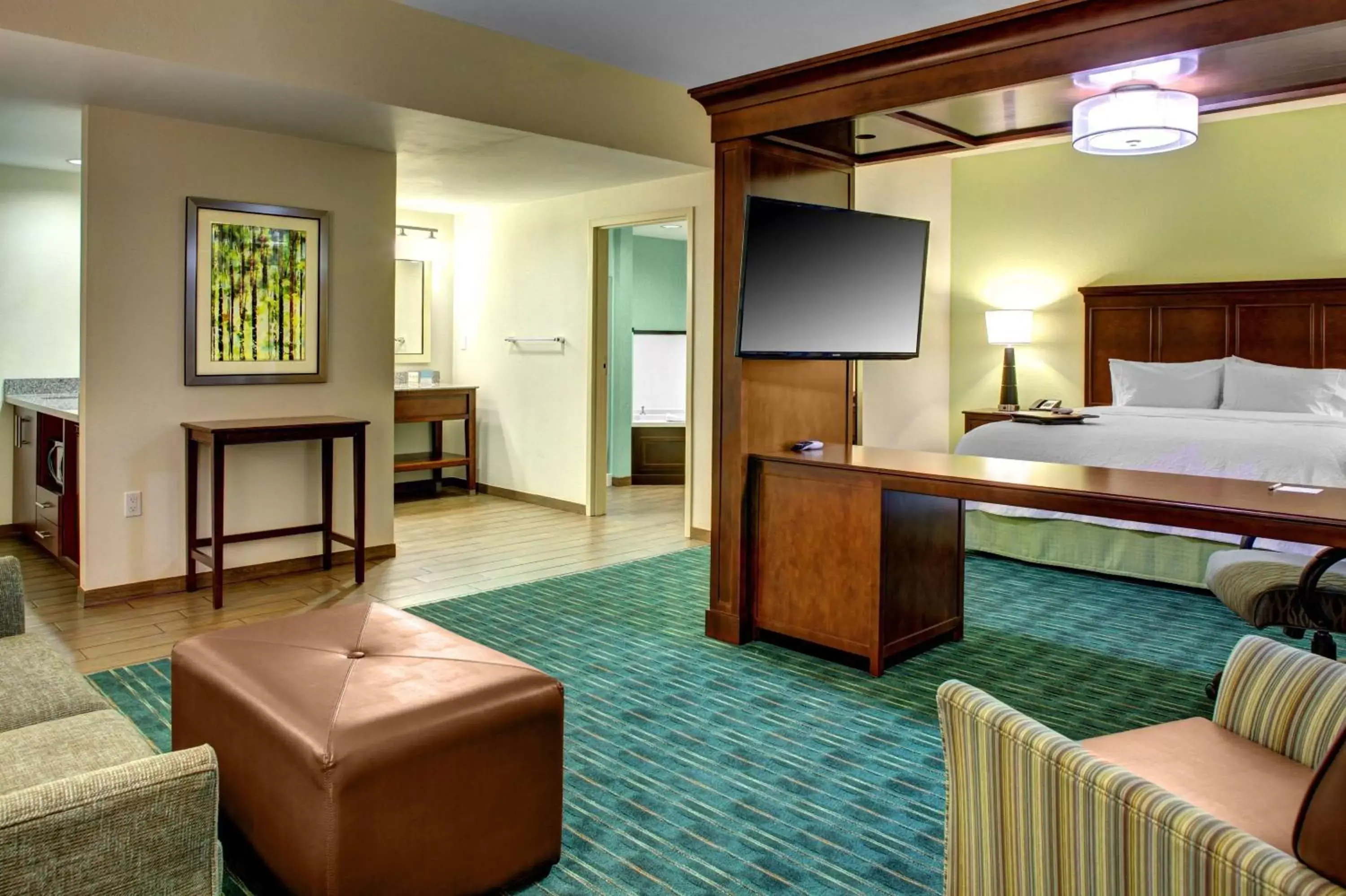 Bed, TV/Entertainment Center in Hampton Inn and Suites Coconut Creek