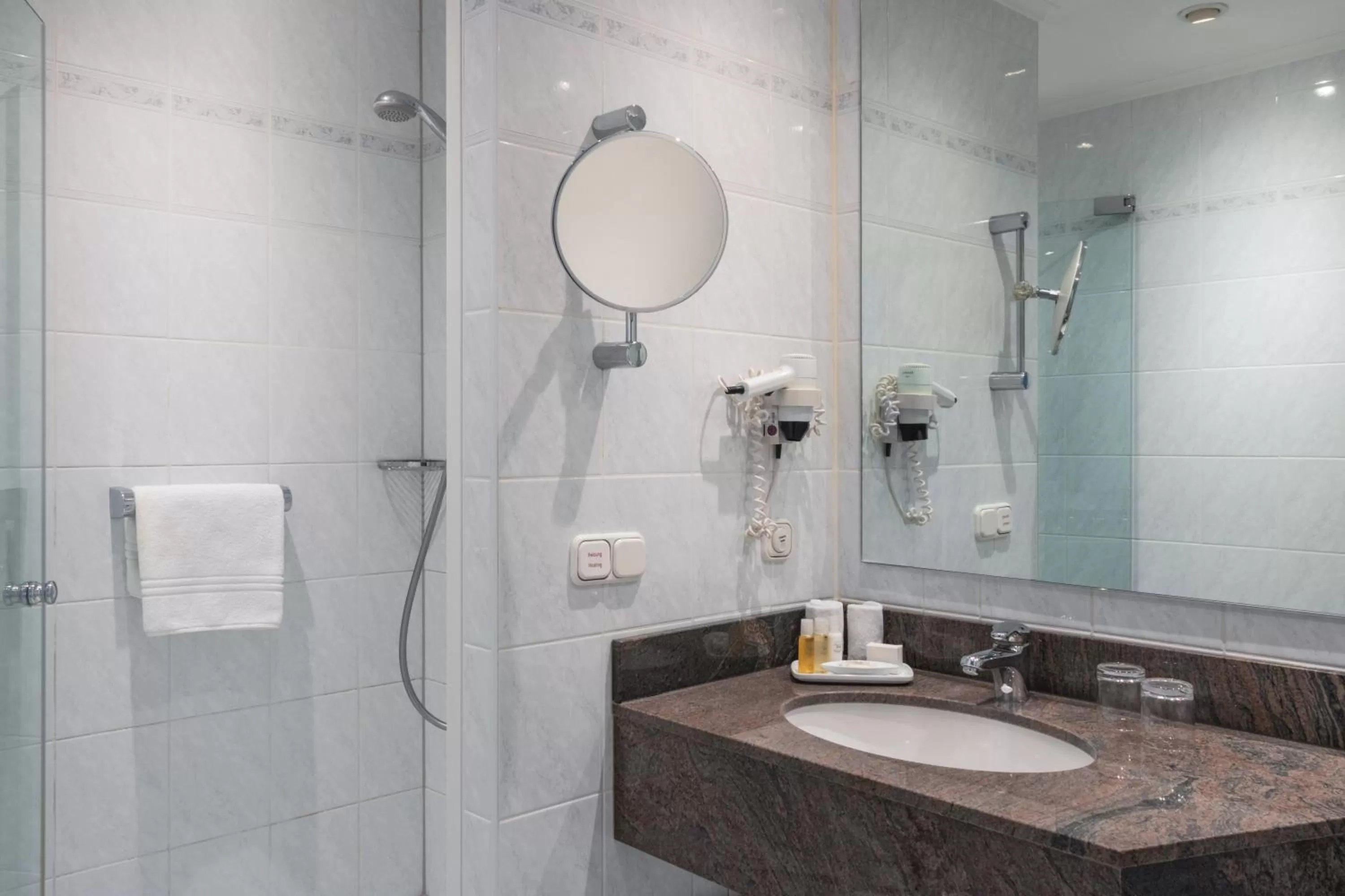 Bathroom in Crowne Plaza Frankfurt Congress Hotel by IHG