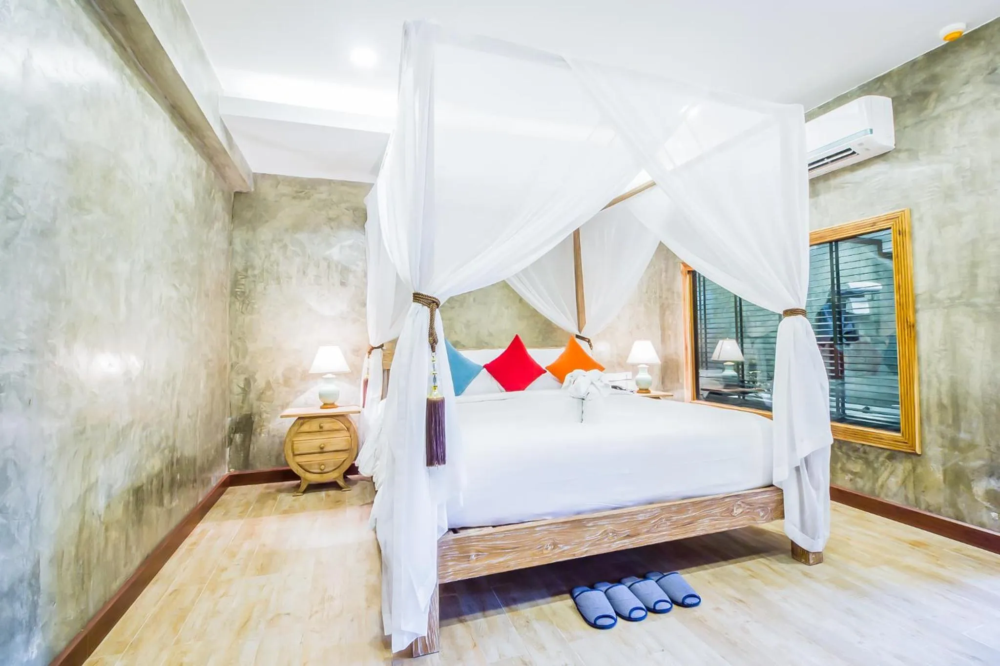 Bed in The Chaya Resort and Spa