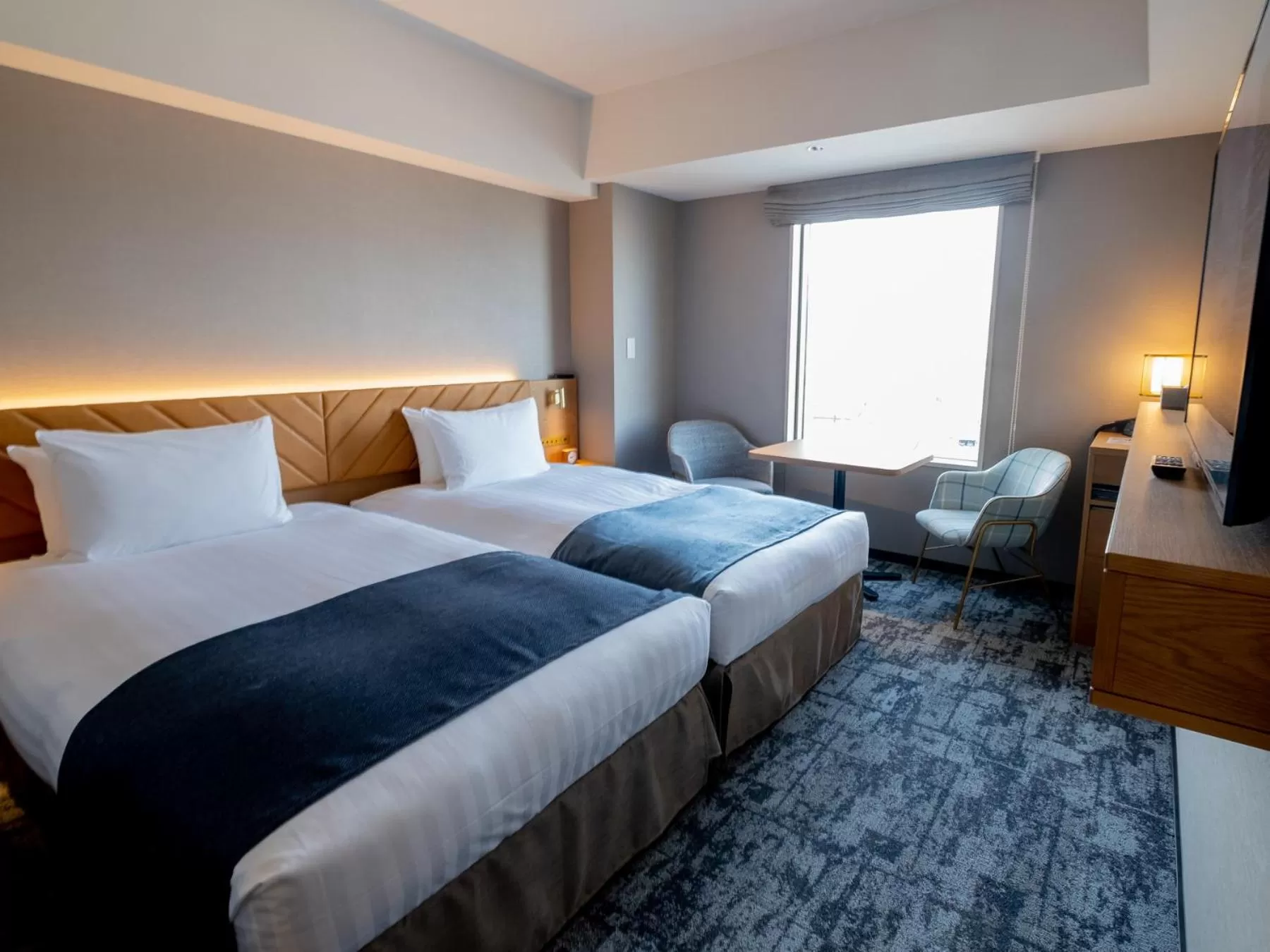 Bed in Tokyu Stay Hakodate Asaichi Akarinoyu